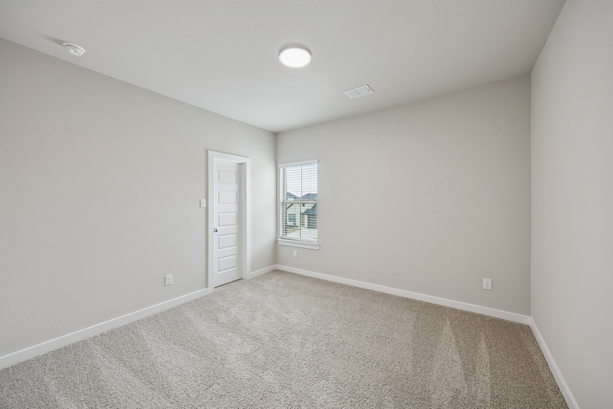 Bedroom in the Stanley II home plan by Trophy Signature Homes – REPRESENTATIVE PHOTO