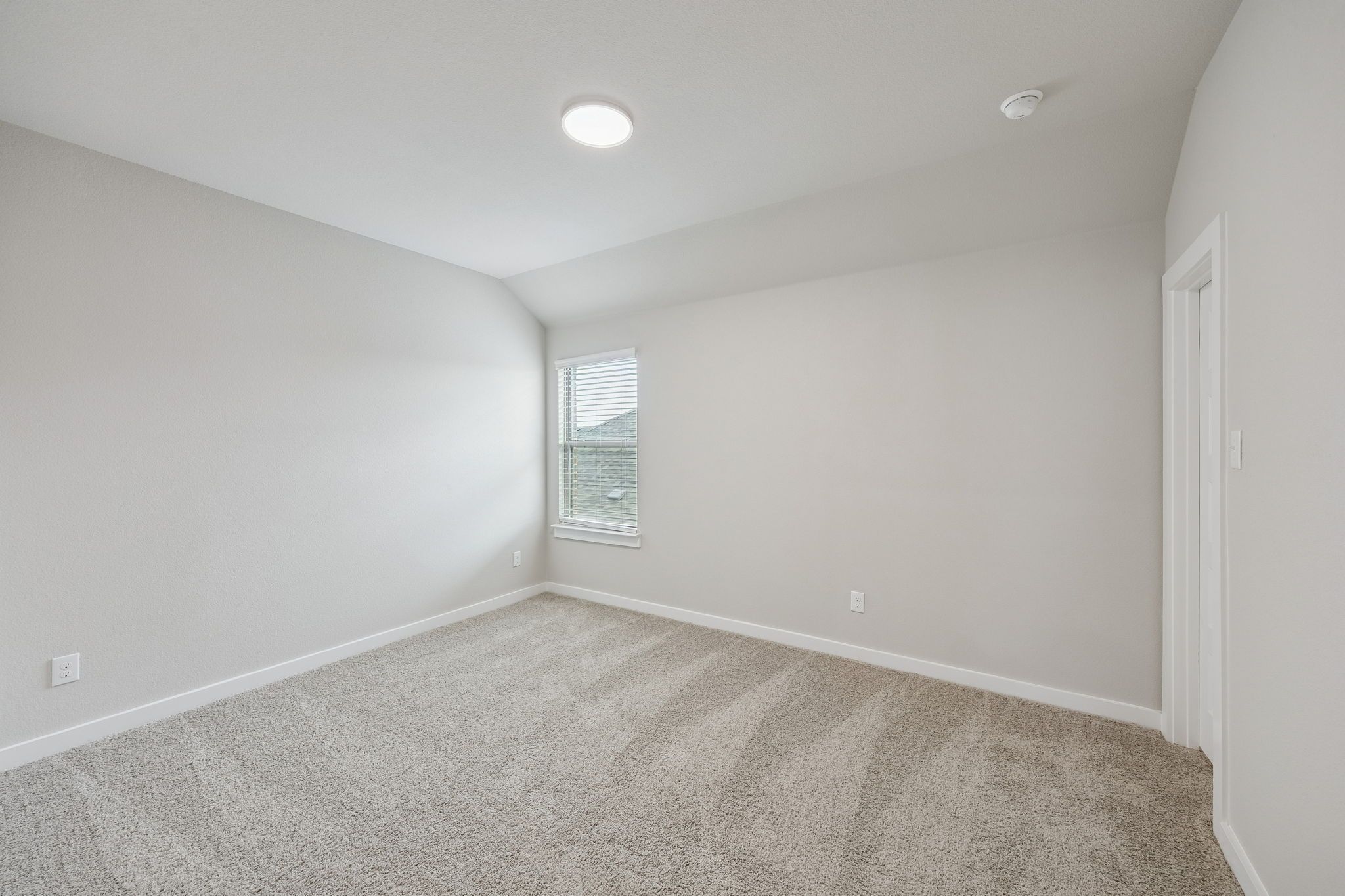 Bedroom in the Stanley II home plan by Trophy Signature Homes – REPRESENTATIVE PHOTO