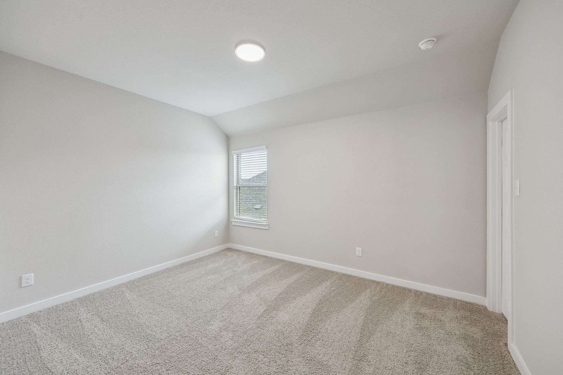 Bedroom in the Stanley II home plan by Trophy Signature Homes – REPRESENTATIVE PHOTO