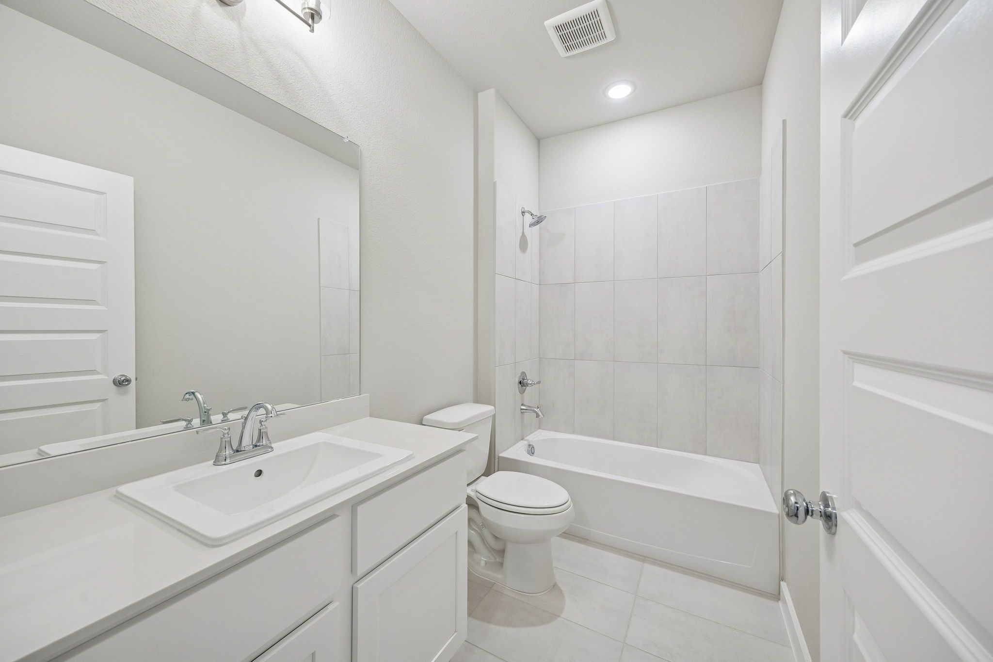 Bathroom in the Stanley II home plan by Trophy Signature Homes – REPRESENTATIVE PHOTO