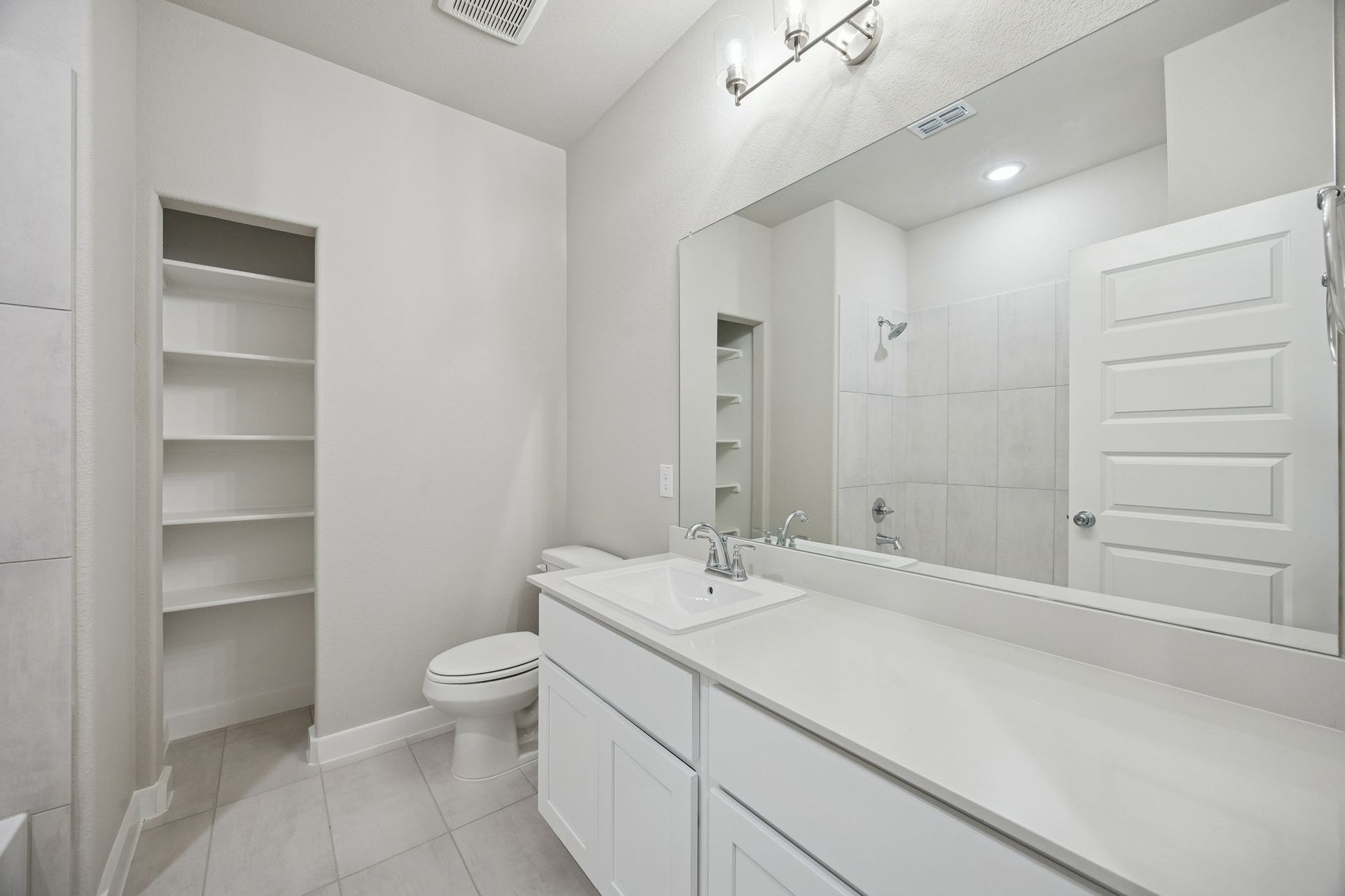 Bathroom in the Stanley II home plan by Trophy Signature Homes – REPRESENTATIVE PHOTO