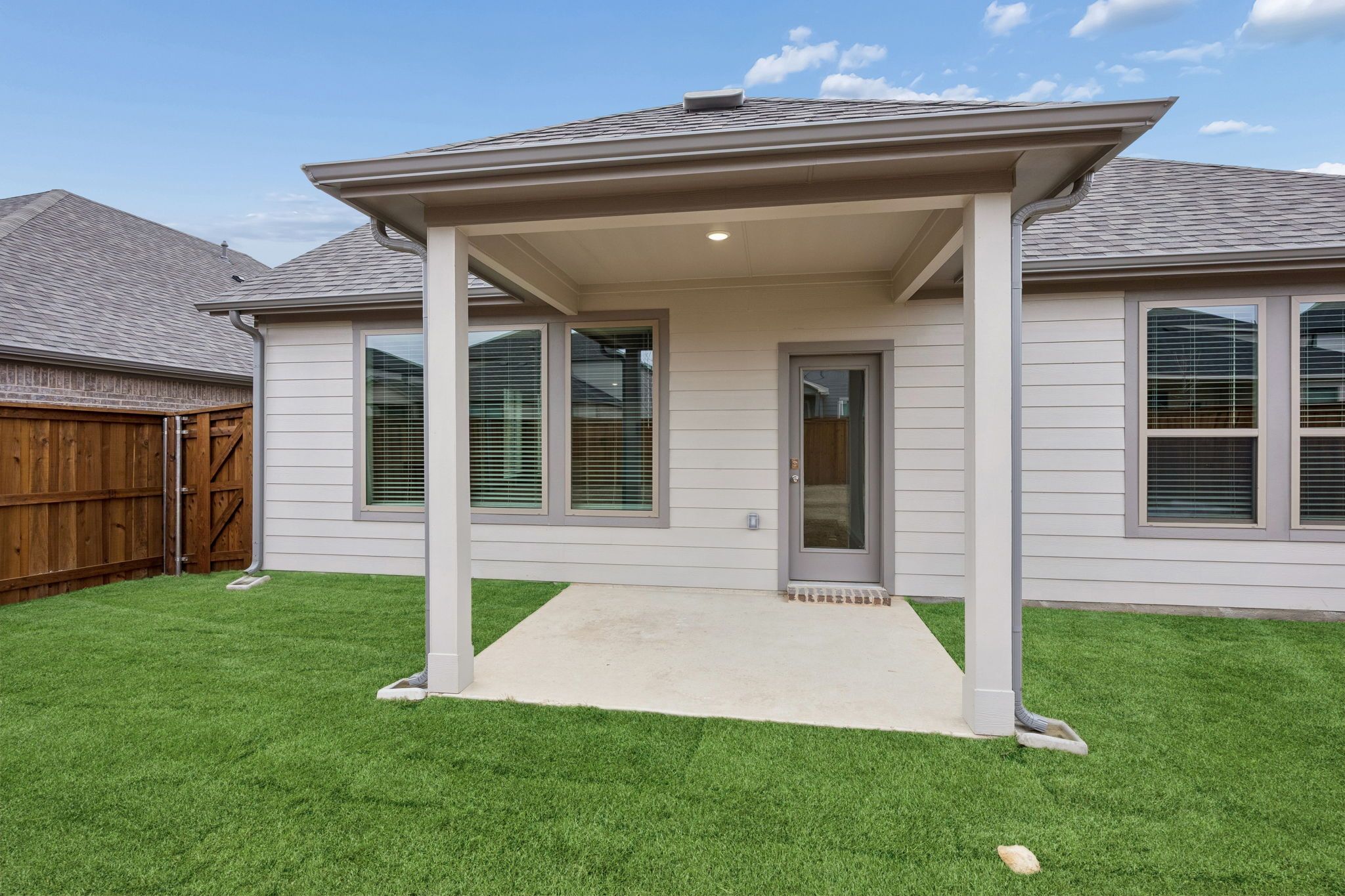 Covered Patio in the Stanley II home plan by Trophy Signature Homes – REPRESENTATIVE PHOTO