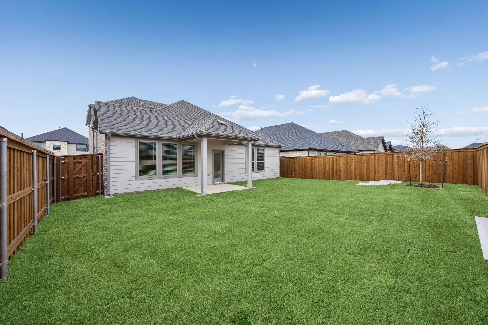 Covered Patio in the Stanley II home plan by Trophy Signature Homes – REPRESENTATIVE PHOTO