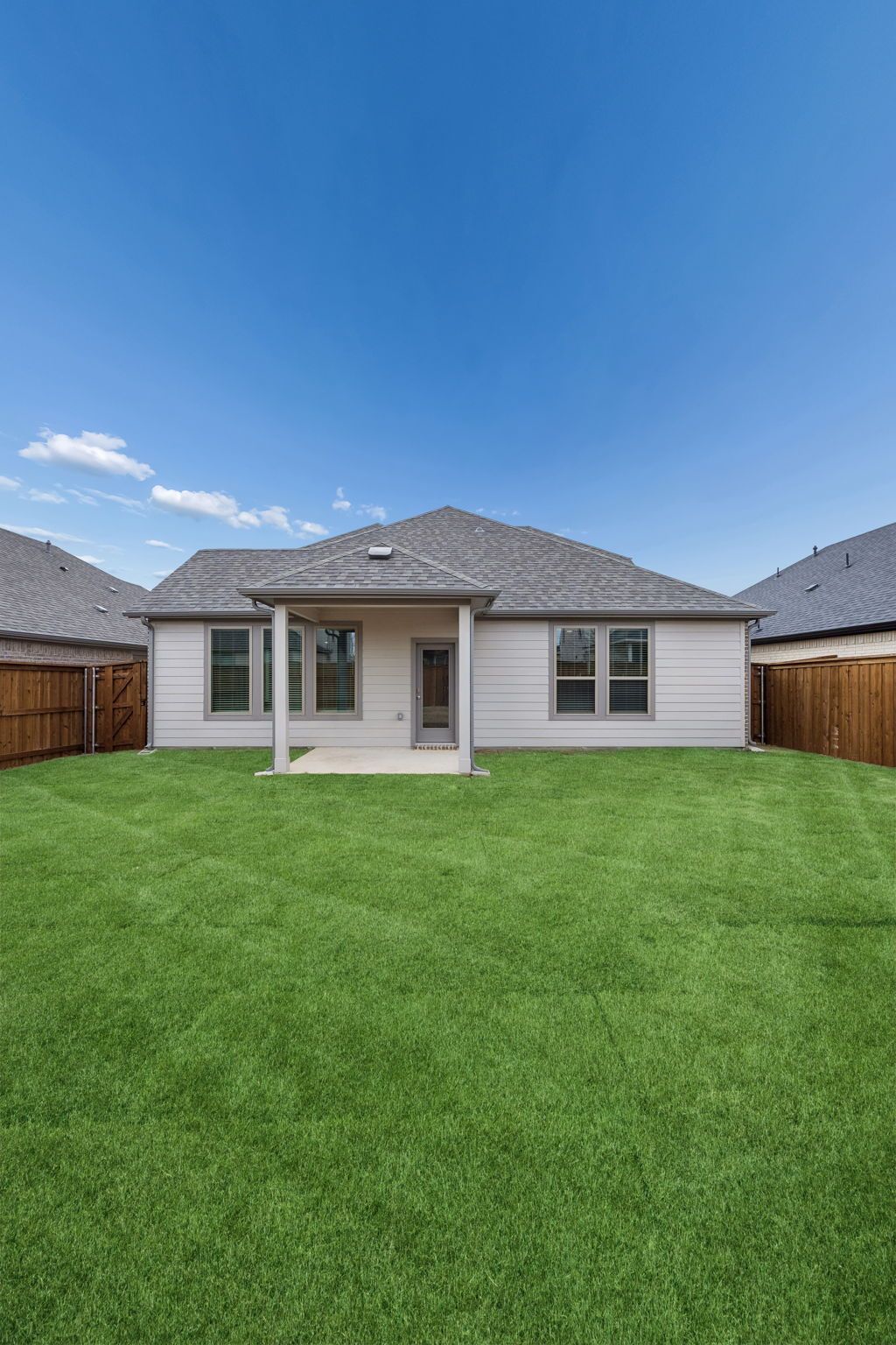 Covered Patio in the Stanley II home plan by Trophy Signature Homes – REPRESENTATIVE PHOTO