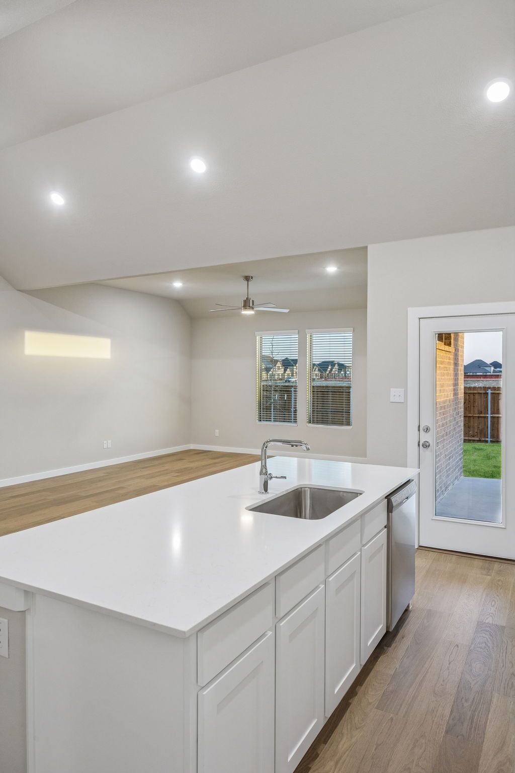 Kitchen in the Wimbledon home plan by Trophy Signature Homes – REPRESENTATIVE PHOTO