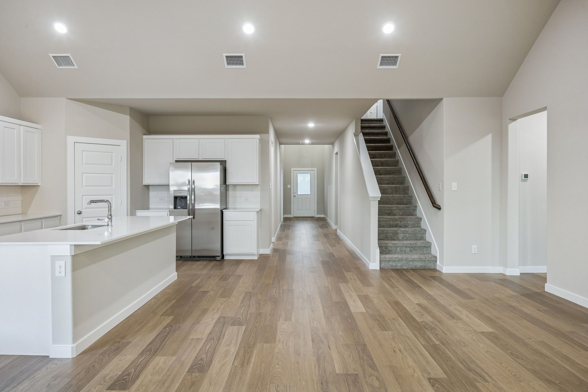 Open First Floor  in the Wimbledon home plan by Trophy Signature Homes – REPRESENTATIVE PHOTO