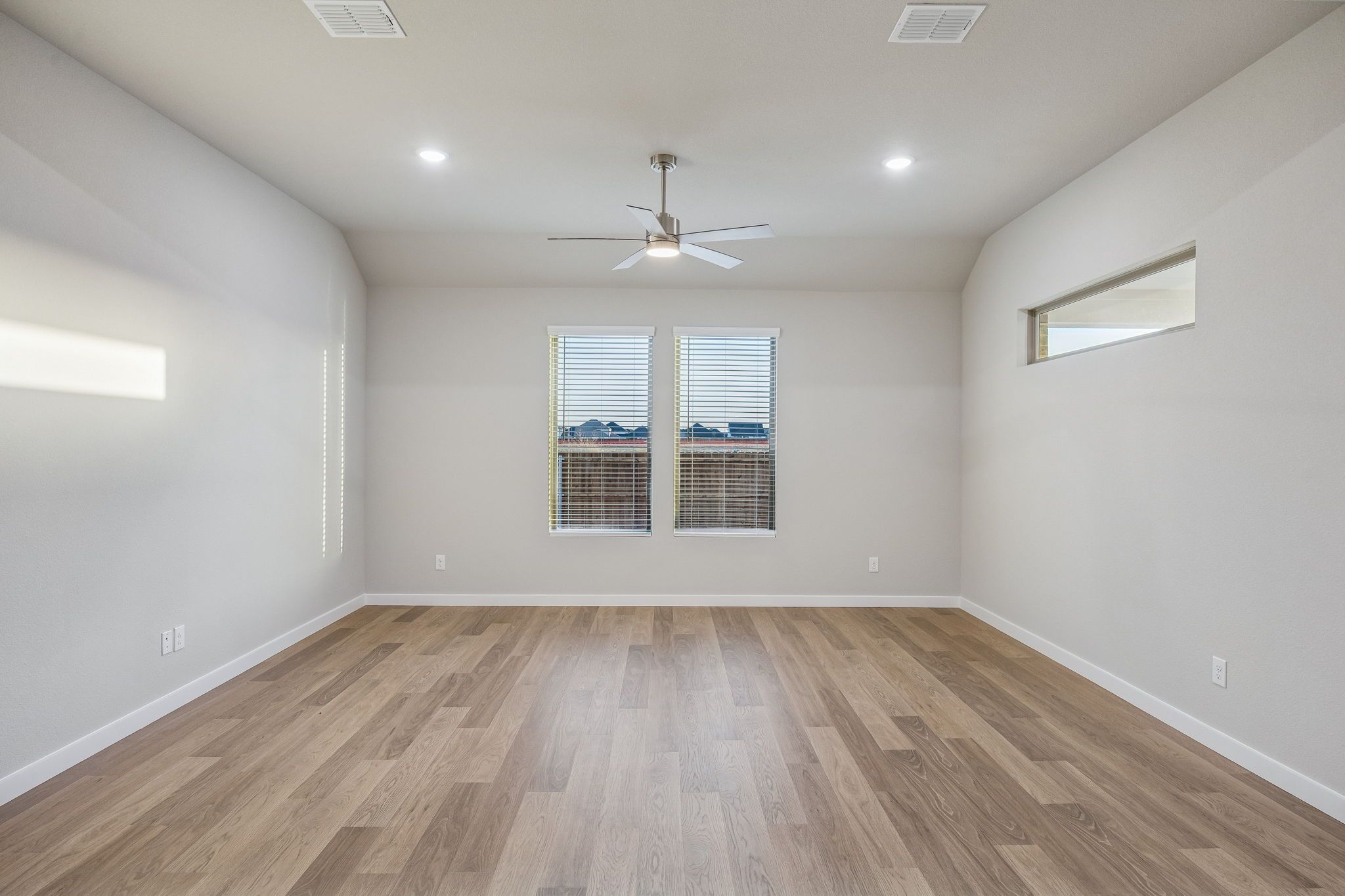 Living Room in the Wimbledon home plan by Trophy Signature Homes – REPRESENTATIVE PHOTO