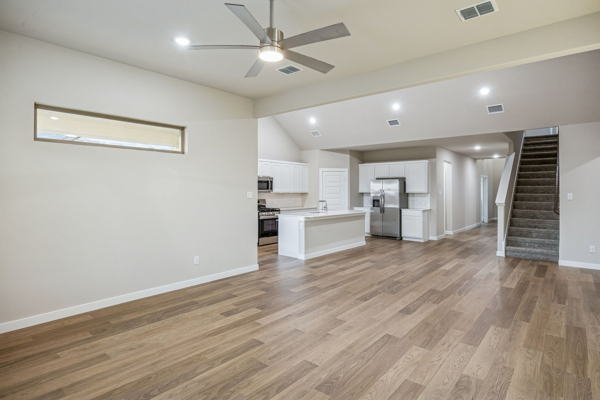 Open First Floor  in the Wimbledon home plan by Trophy Signature Homes – REPRESENTATIVE PHOTO