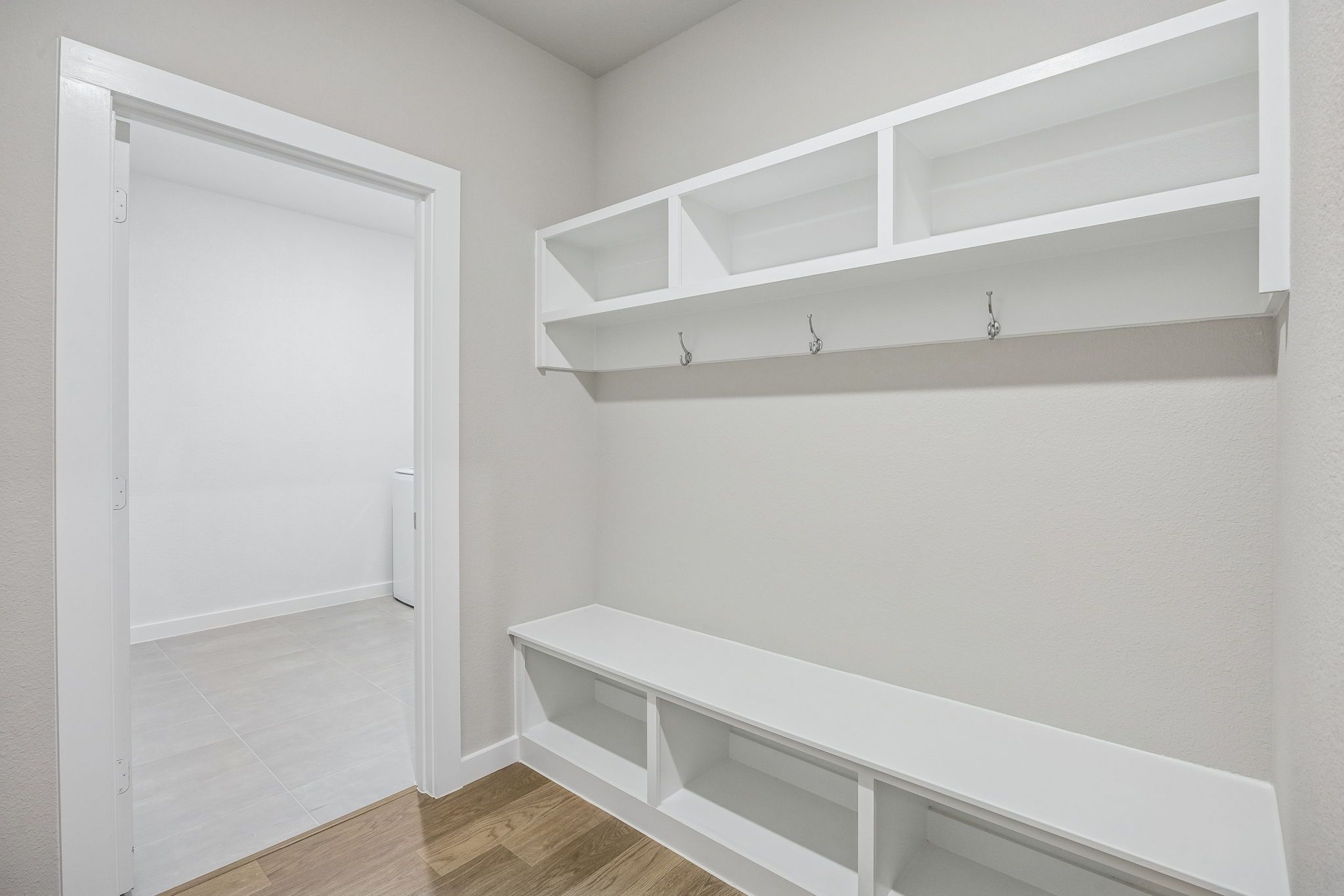 Utility Room in the Wimbledon home plan by Trophy Signature Homes – REPRESENTATIVE PHOTO