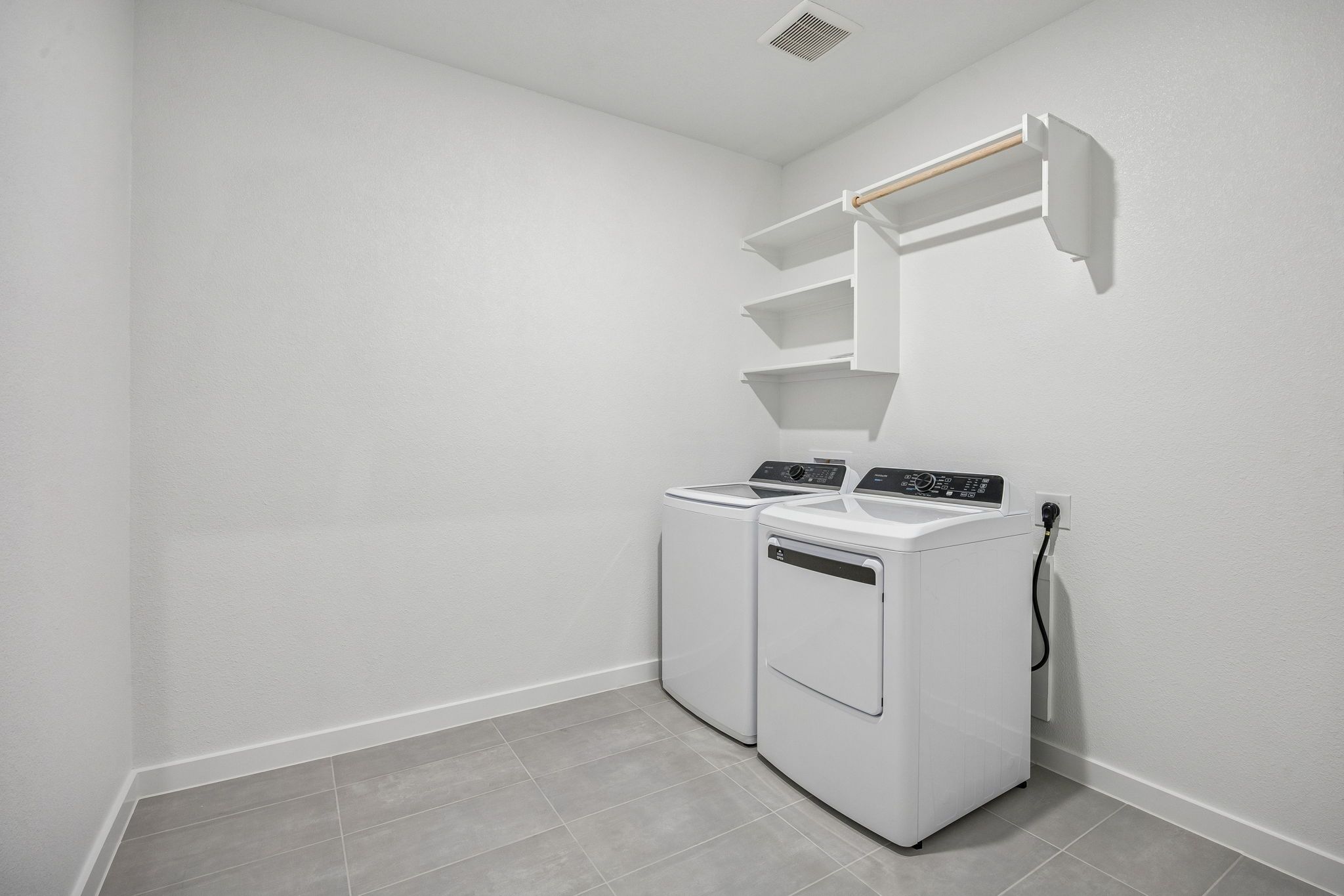 Utility Room in the Wimbledon home plan by Trophy Signature Homes – REPRESENTATIVE PHOTO