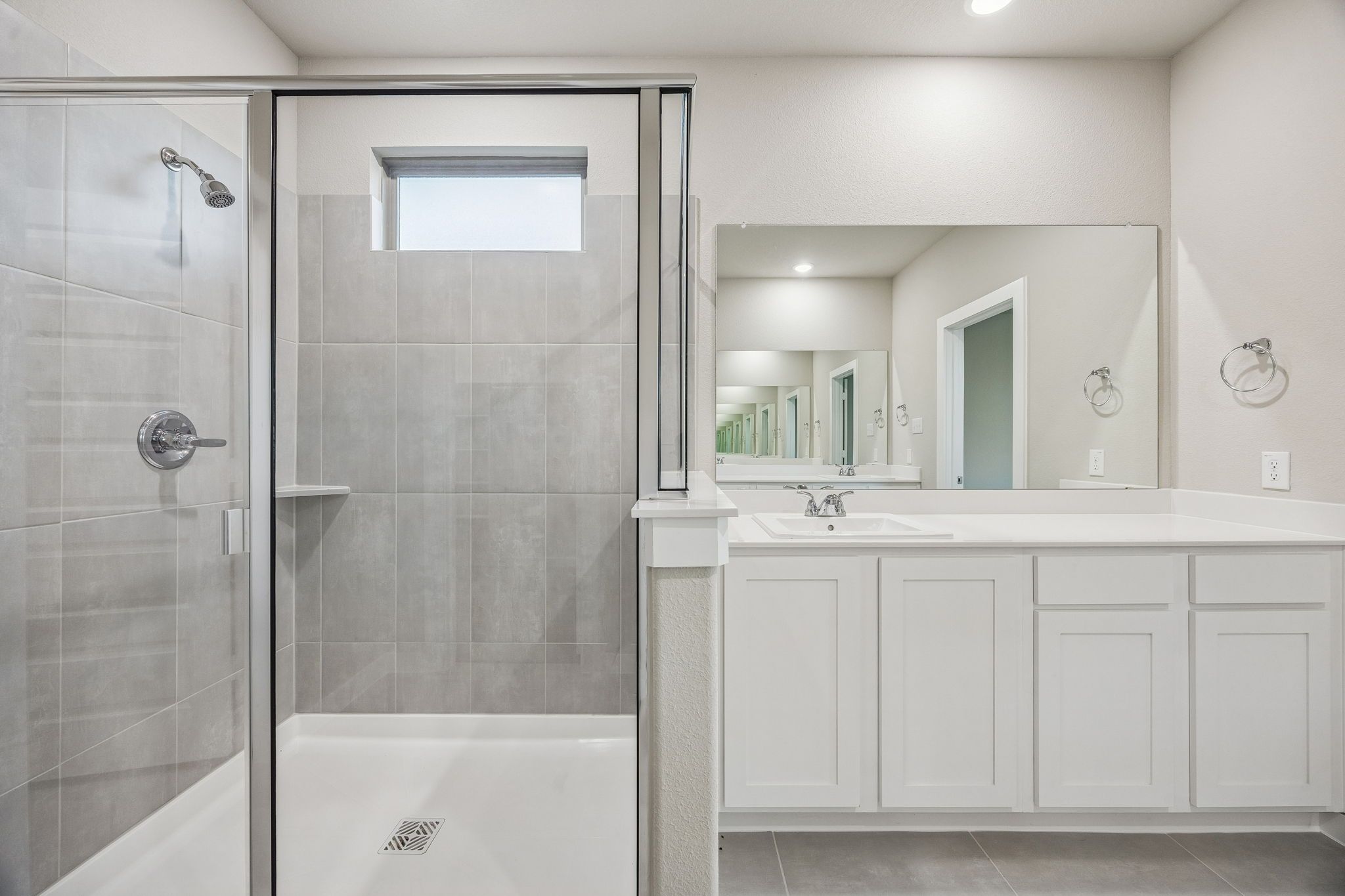 Primary Bathroom in the Wimbledon home plan by Trophy Signature Homes – REPRESENTATIVE PHOTO