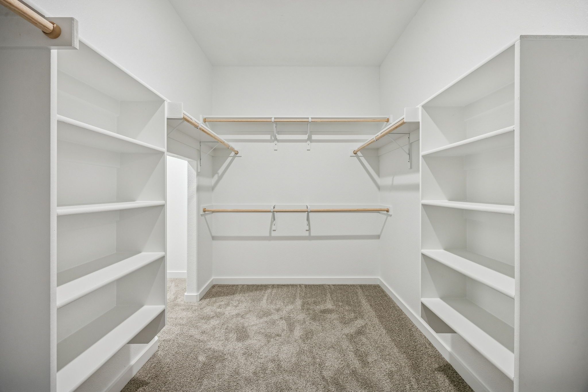 Primary Closet in the Wimbledon home plan by Trophy Signature Homes – REPRESENTATIVE PHOTO