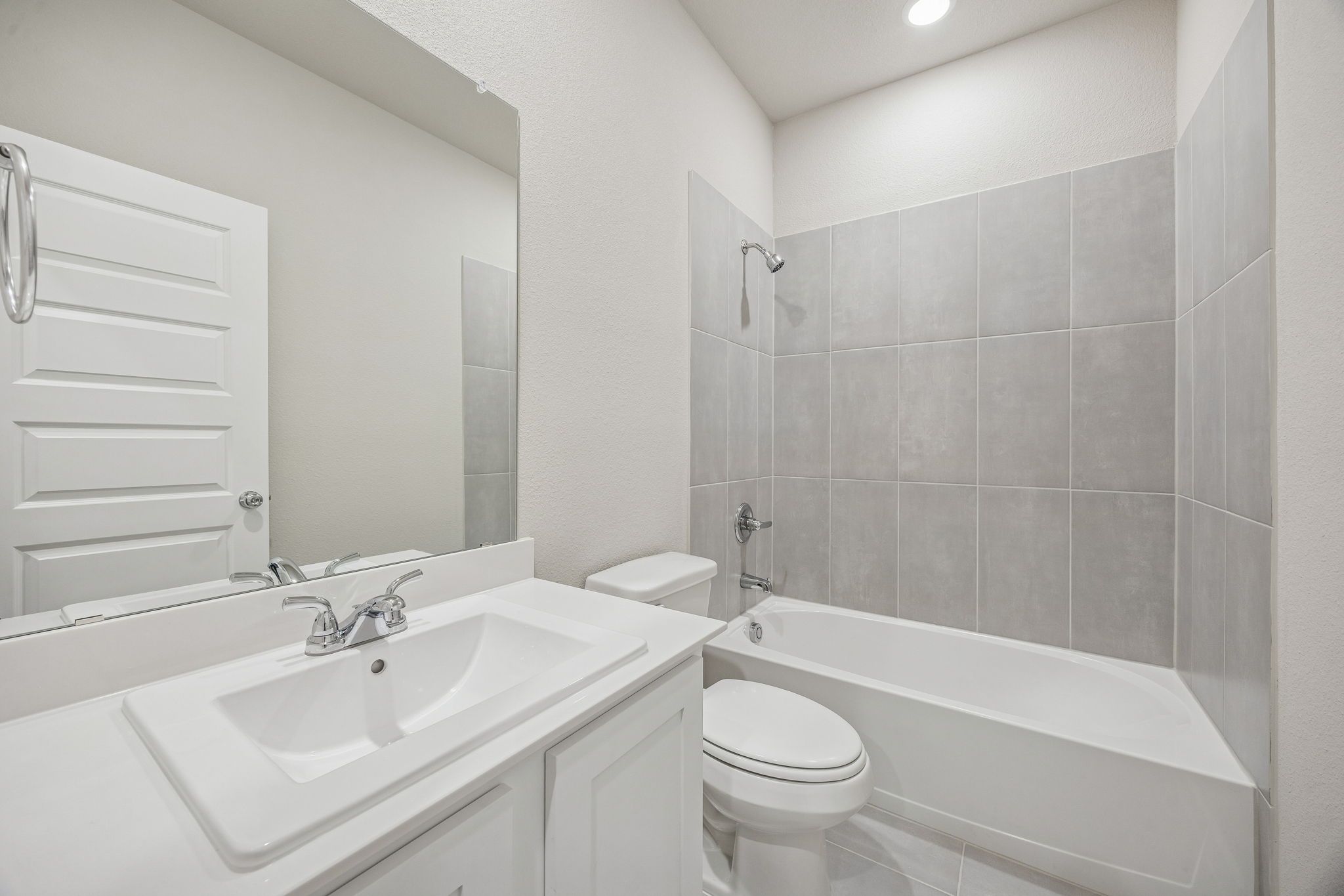 Bathroom in the Wimbledon home plan by Trophy Signature Homes – REPRESENTATIVE PHOTO