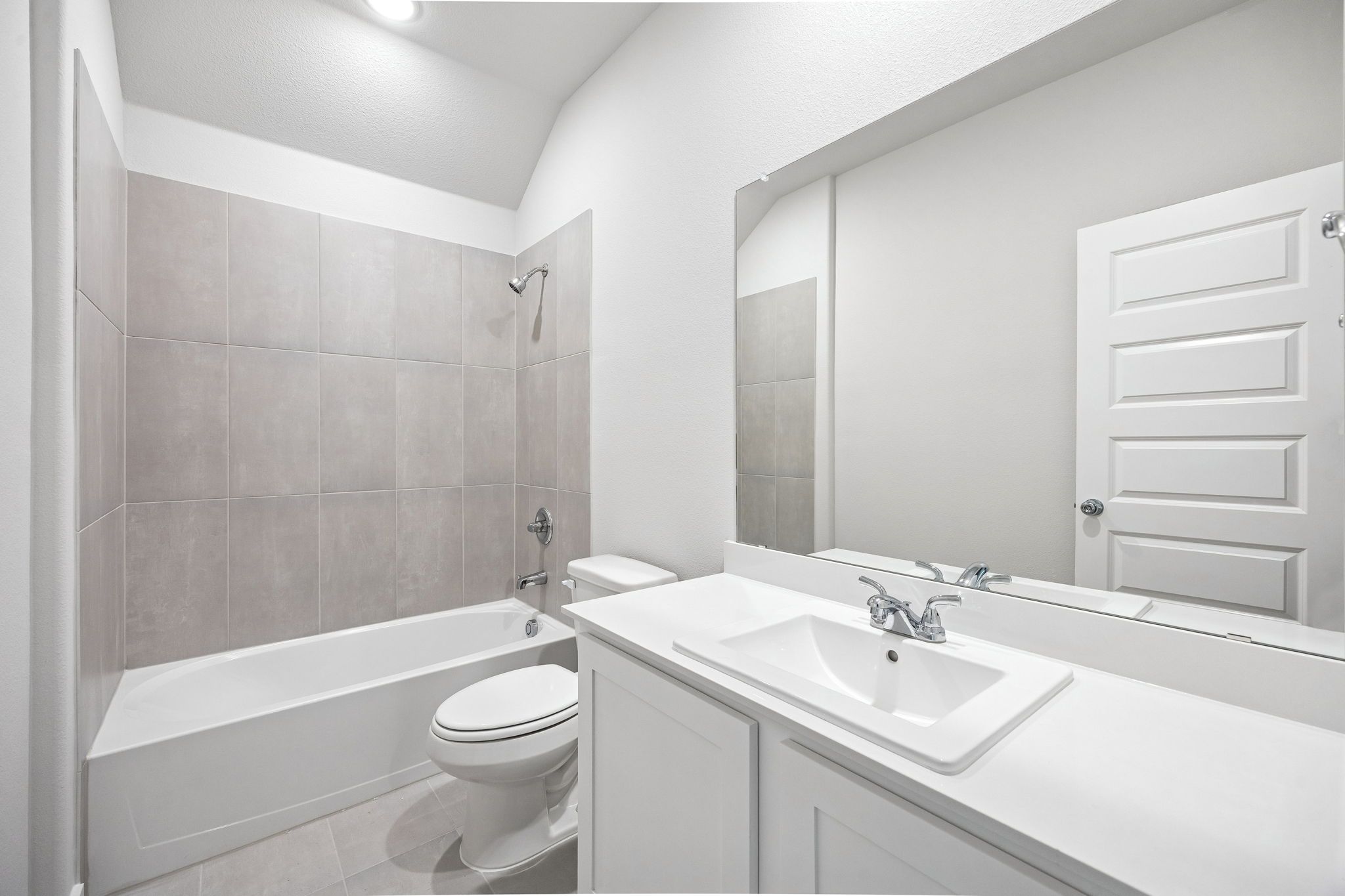 Bathroom in the Heisman home plan by Trophy Signature Homes - REPRESENTATIVE PHOTO