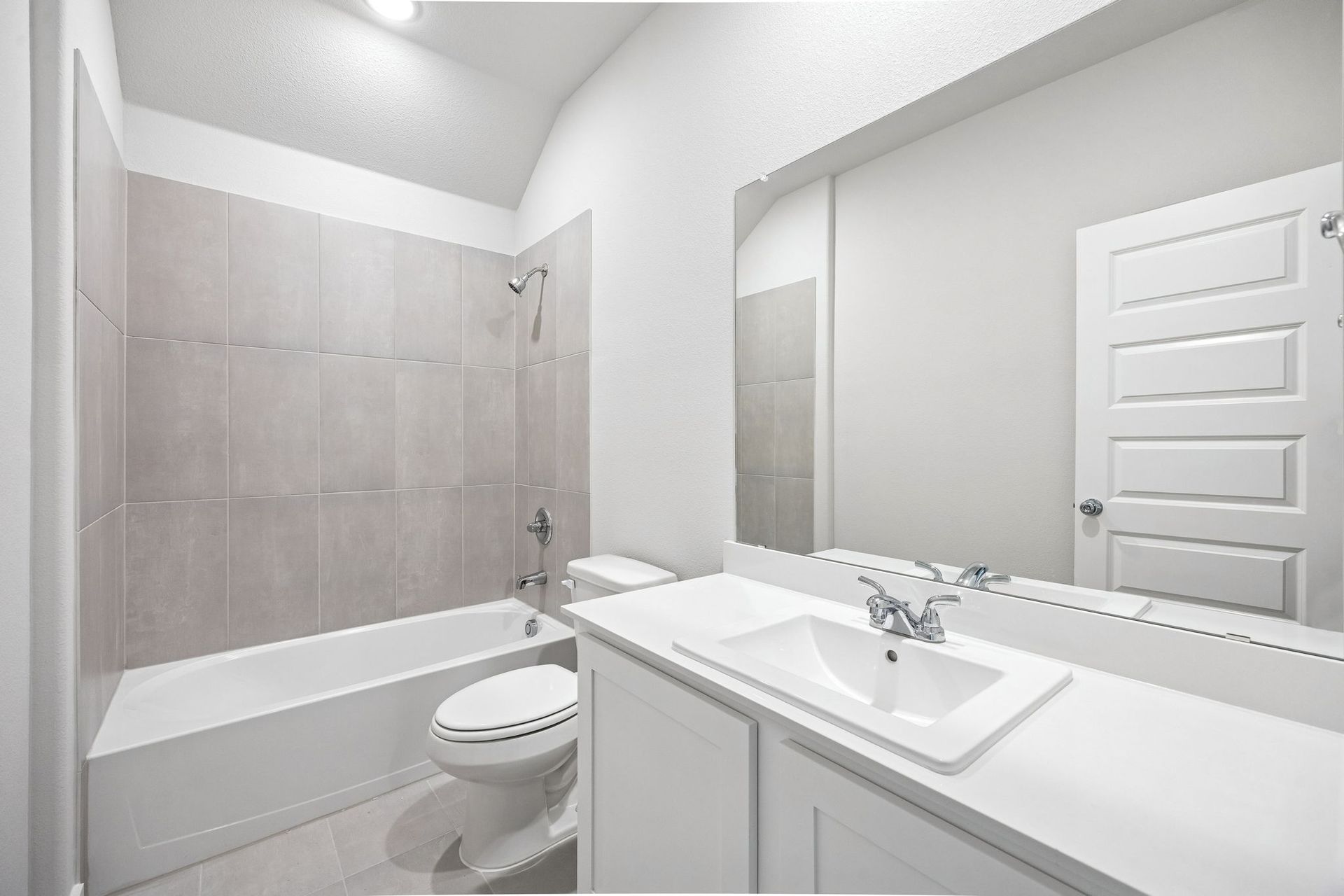 Bathroom in the Heisman home plan by Trophy Signature Homes - REPRESENTATIVE PHOTO