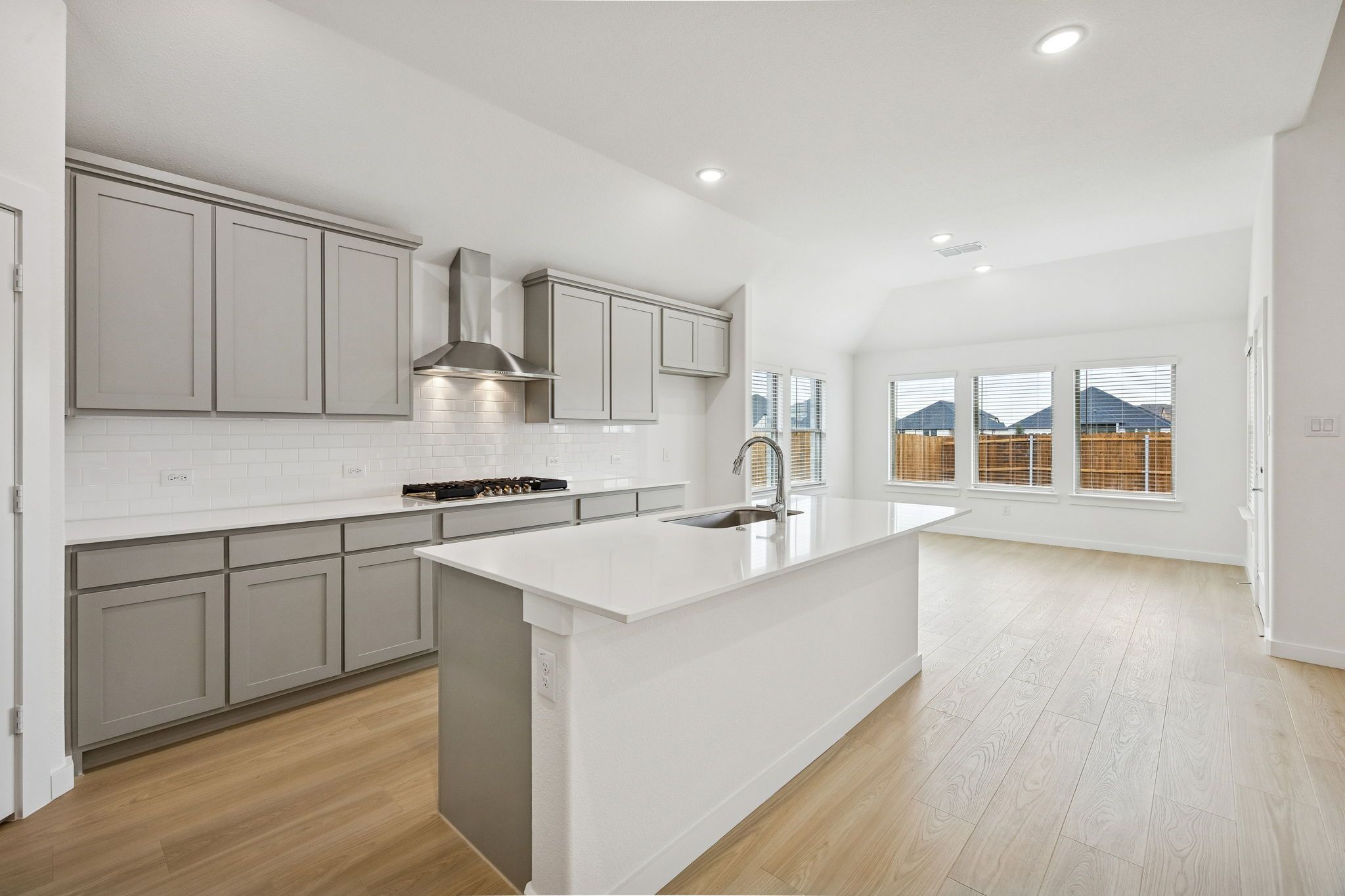 Kitchen in the Gilmour II home plan by Trophy Signature Homes – REPRESENTATIVE PHOTO
