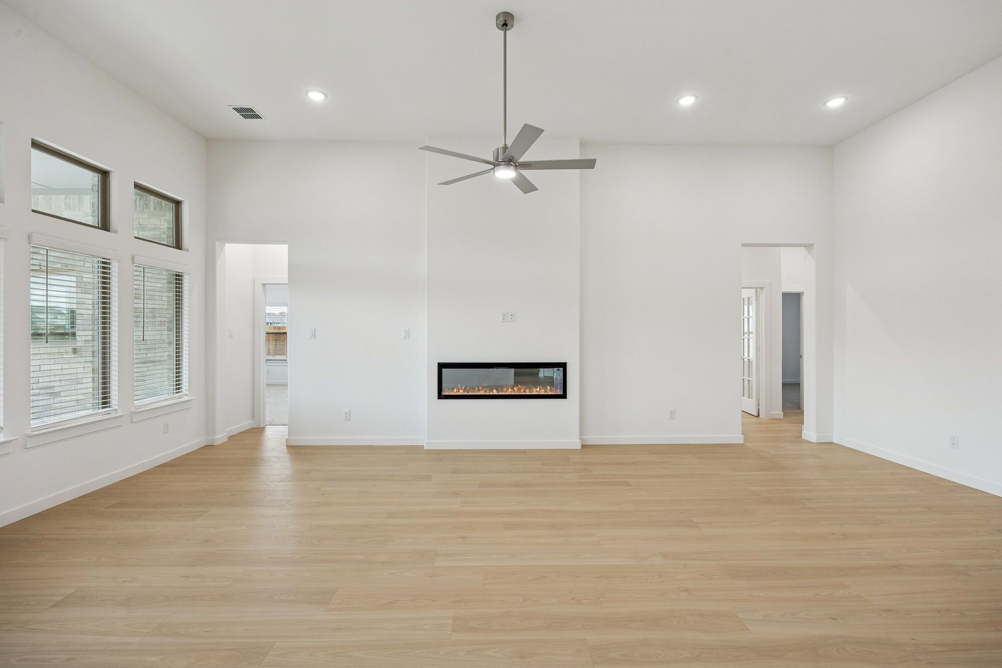 Living Room in the Gilmour II home plan by Trophy Signature Homes – REPRESENTATIVE PHOTO