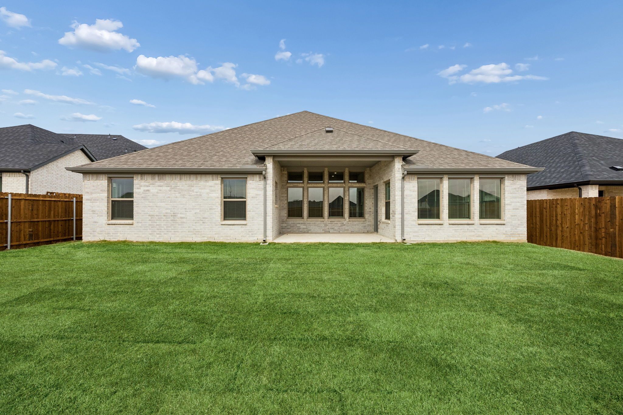 Covered Patio in the Gilmour II home plan by Trophy Signature Homes – REPRESENTATIVE PHOTO