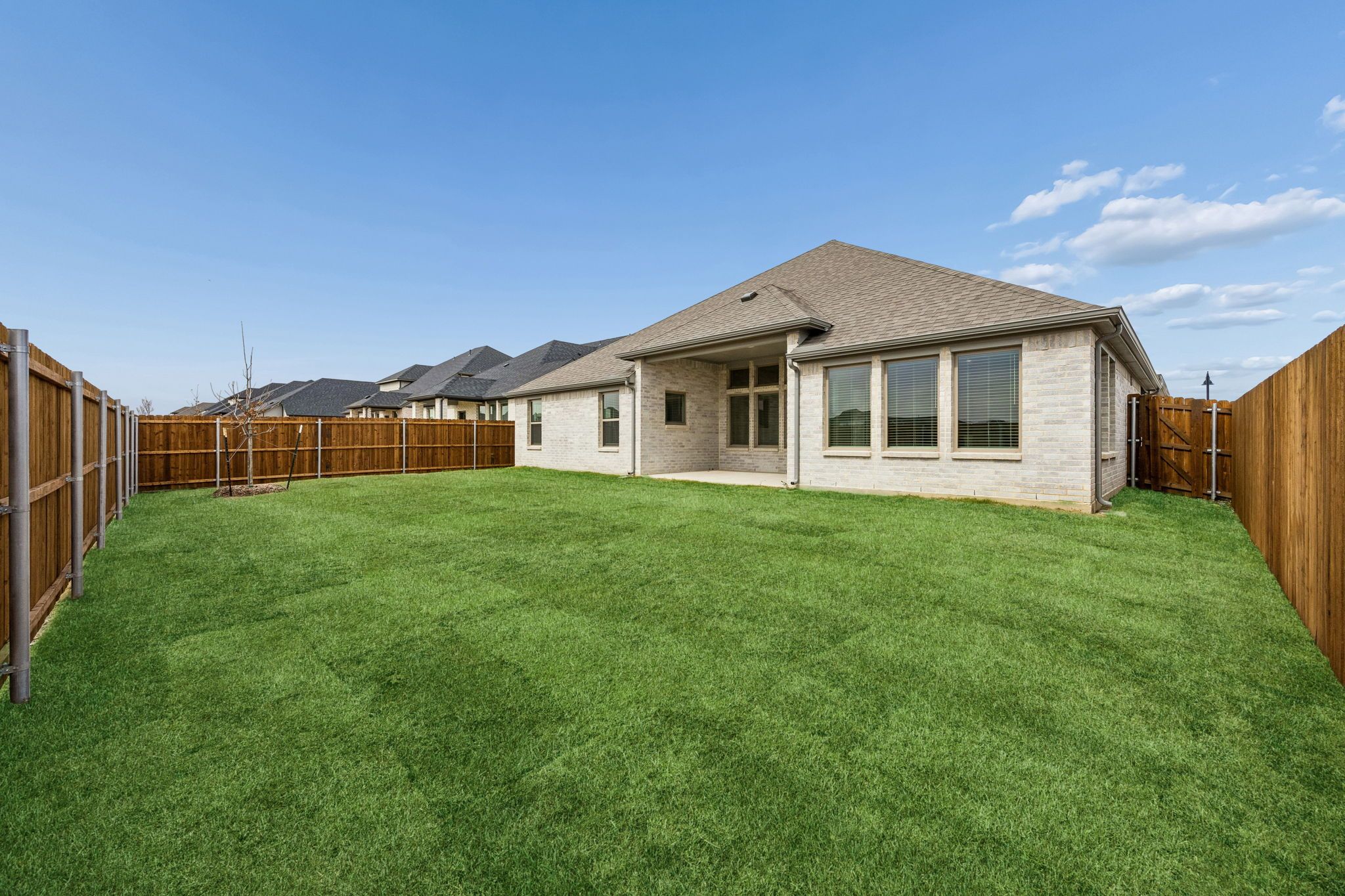 Covered Patio in the Gilmour II home plan by Trophy Signature Homes – REPRESENTATIVE PHOTO