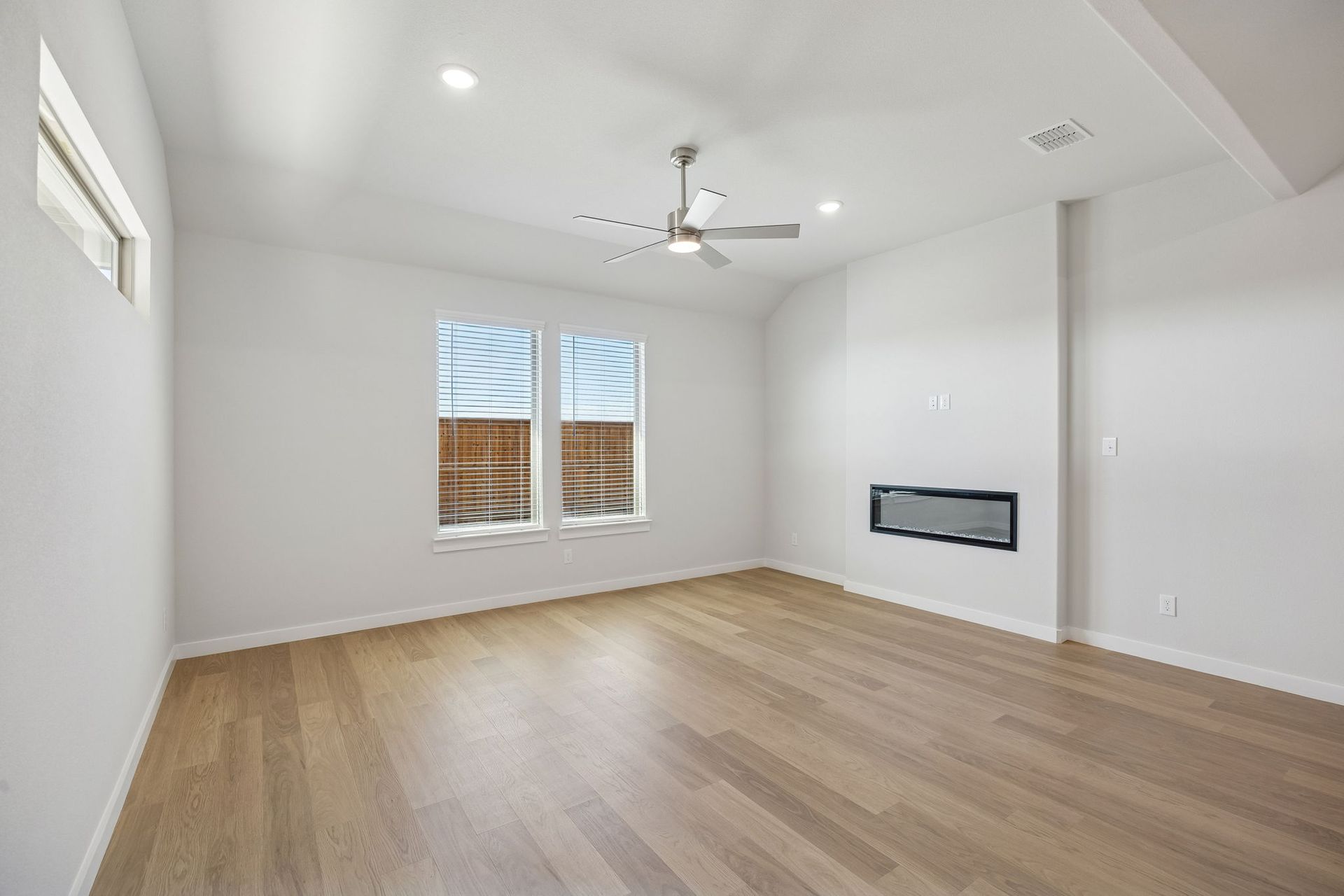 Living Room in the Wimbledon home plan by Trophy Signature Homes – REPRESENTATIVE PHOTO