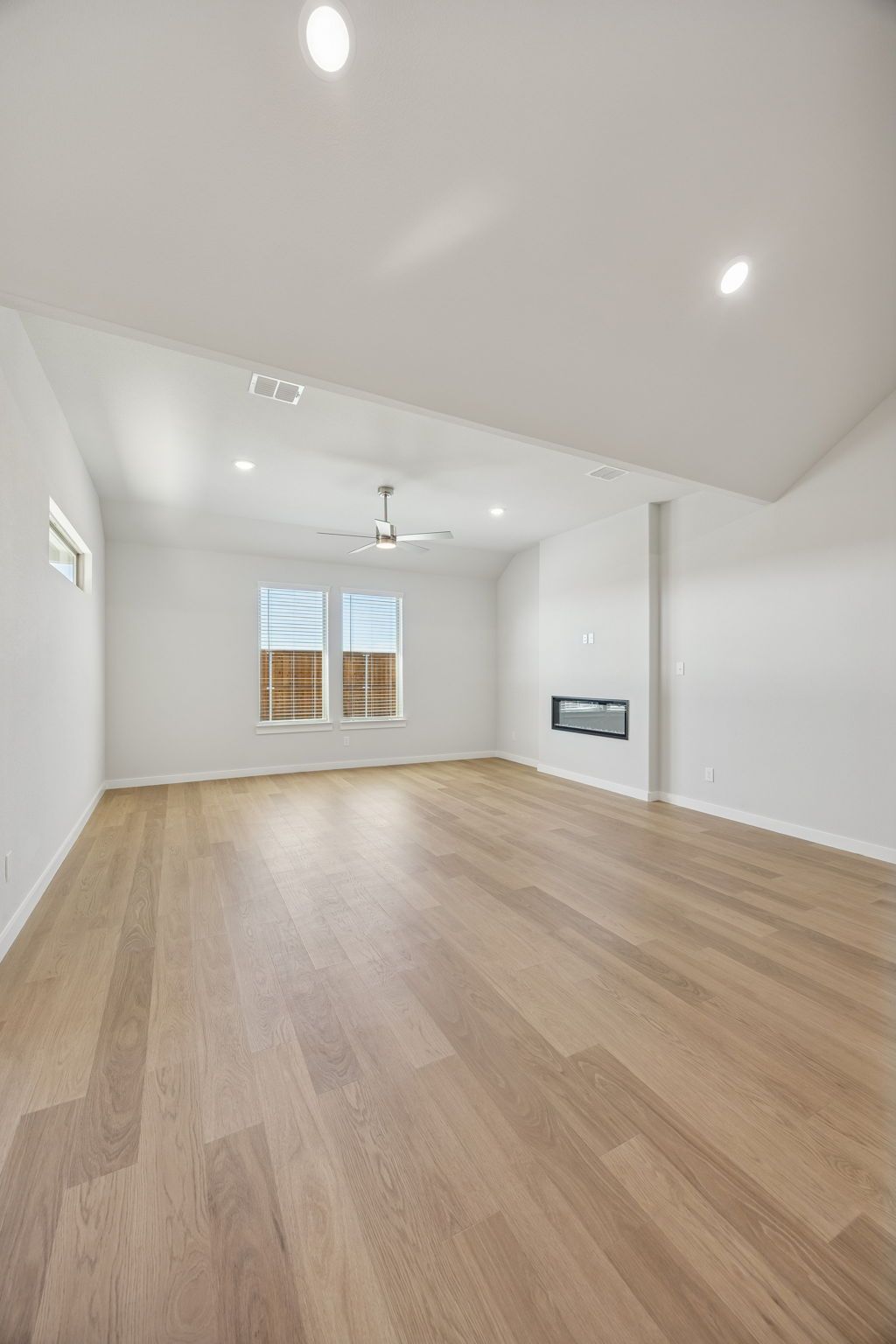 Living Room in the Wimbledon home plan by Trophy Signature Homes – REPRESENTATIVE PHOTO