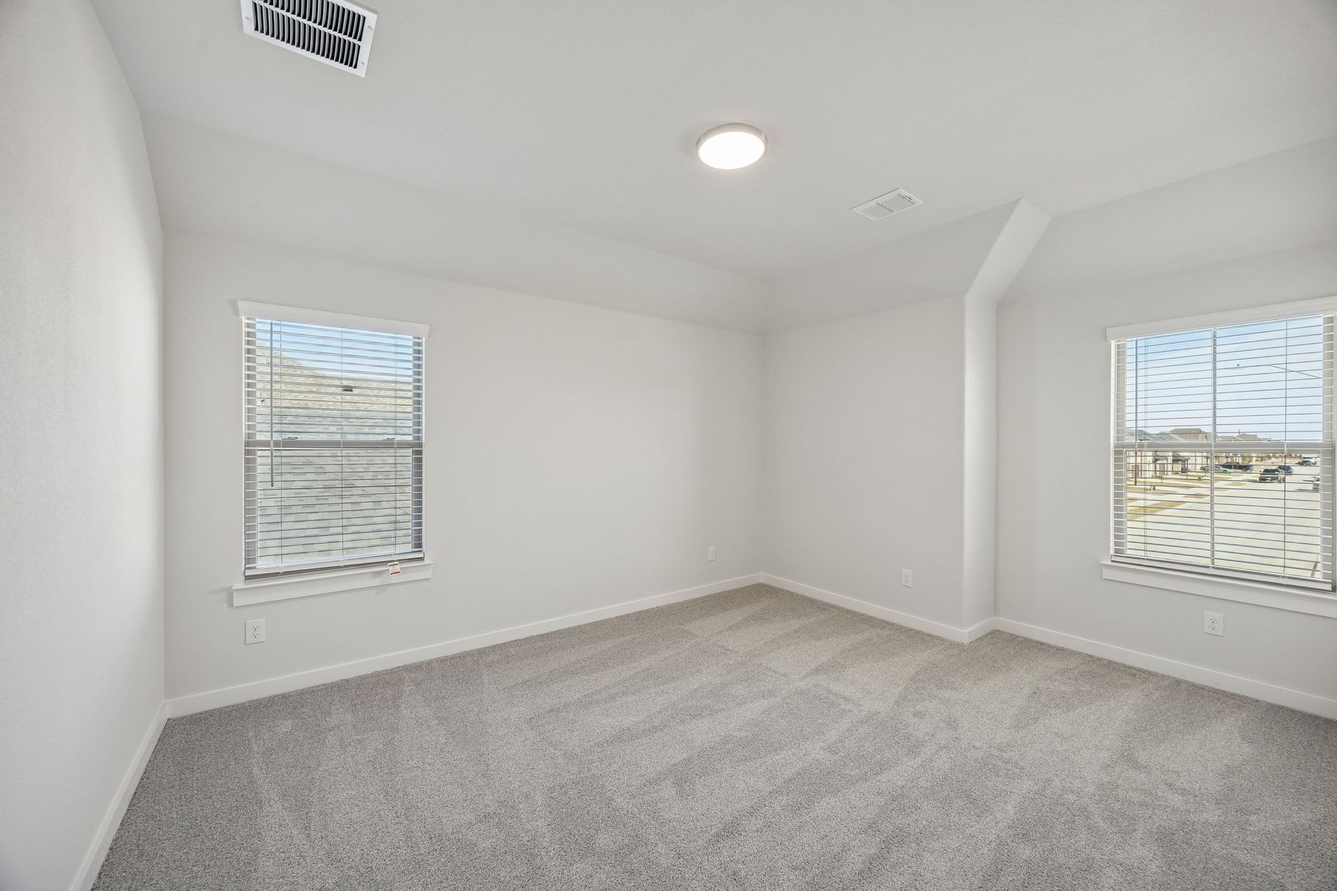 Bedroom in the Wimbledon home plan by Trophy Signature Homes – REPRESENTATIVE PHOTO