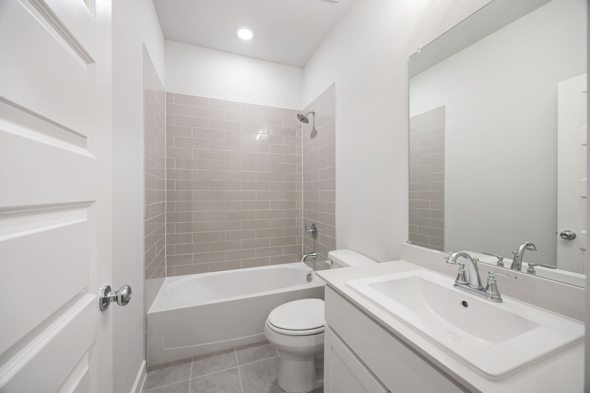 Bathroom in the Wimbledon home plan by Trophy Signature Homes – REPRESENTATIVE PHOTO