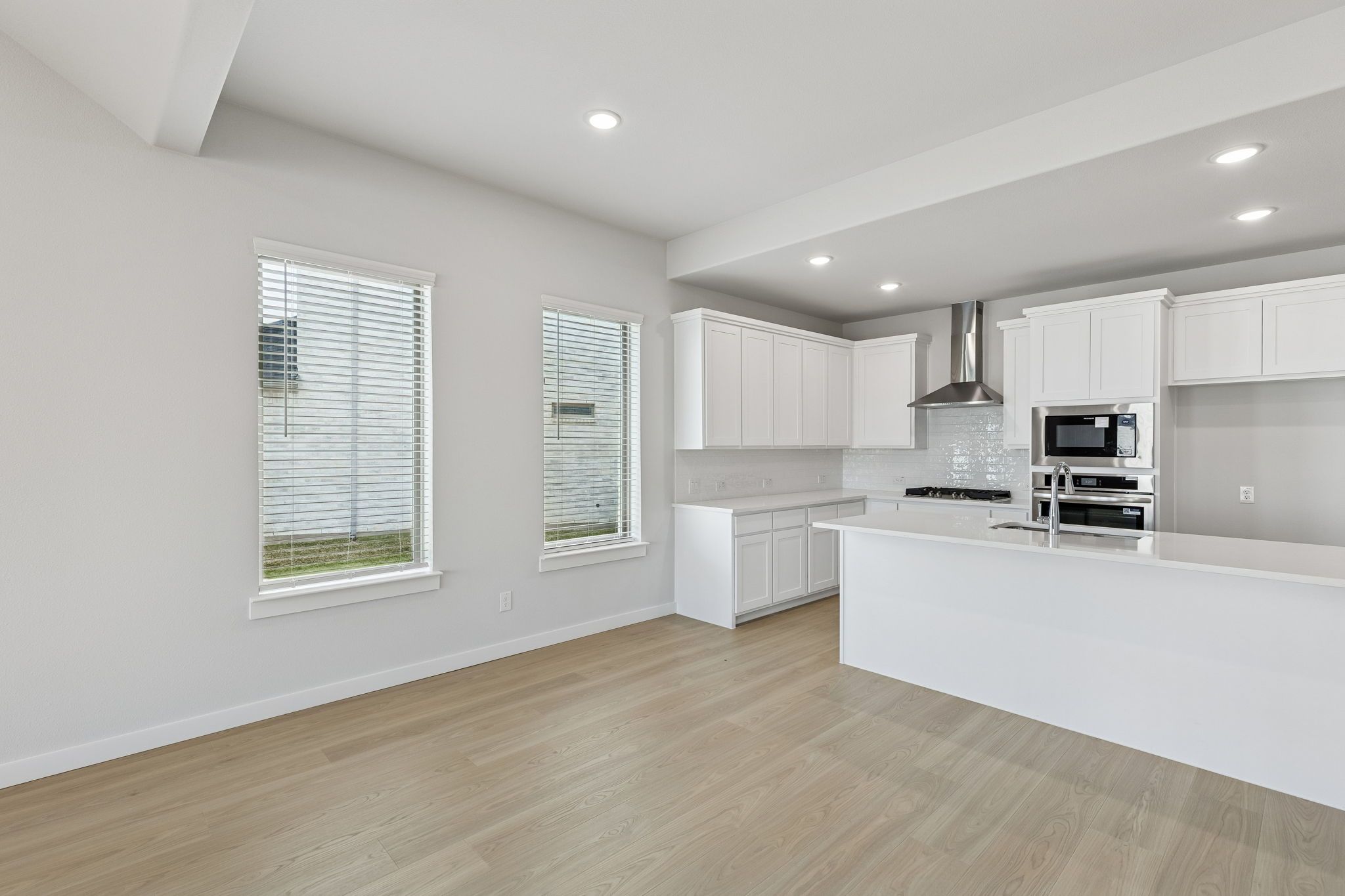 Kitchen in the Stanley II home plan by Trophy Signature Homes – REPRESENTATIVE PHOTO