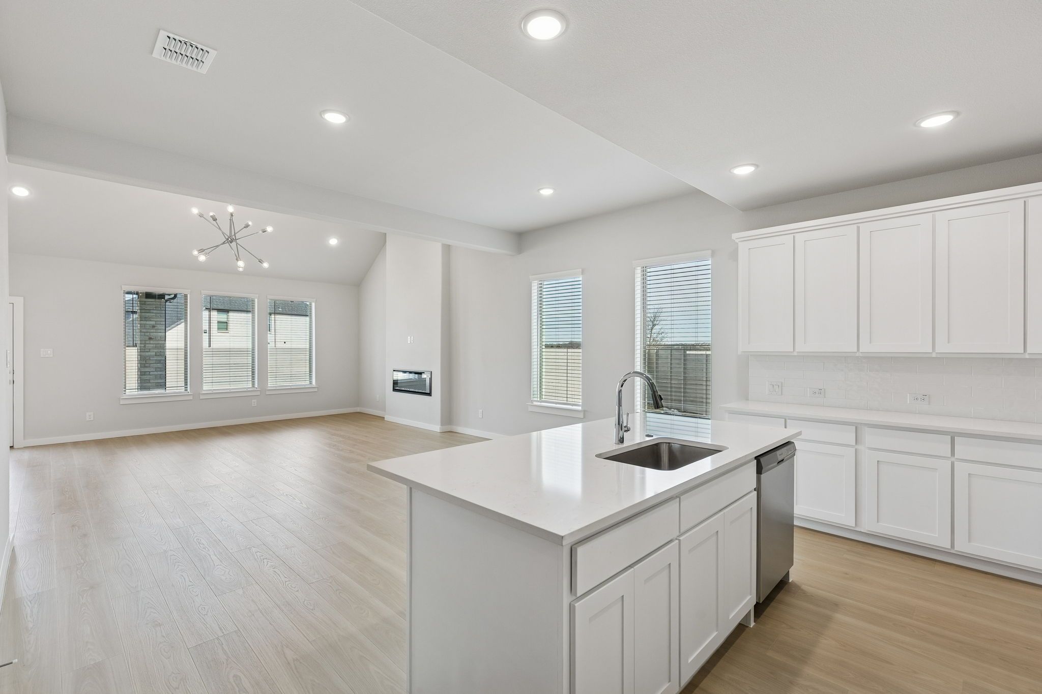 Kitchen in the Stanley II home plan by Trophy Signature Homes – REPRESENTATIVE PHOTO