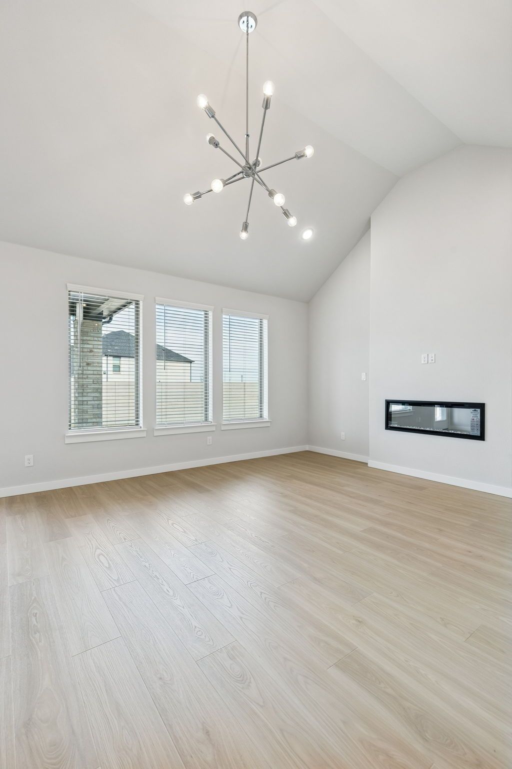Living Room in the Stanley II home plan by Trophy Signature Homes – REPRESENTATIVE PHOTO