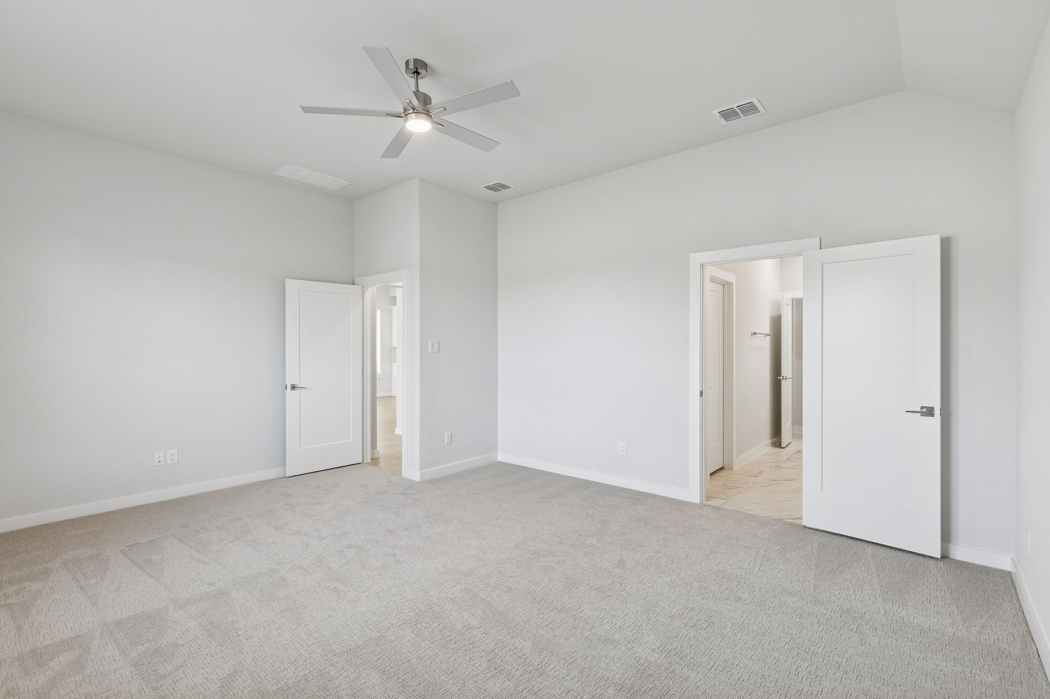 Primary Suite in the Stanley II home plan by Trophy Signature Homes – REPRESENTATIVE PHOTO