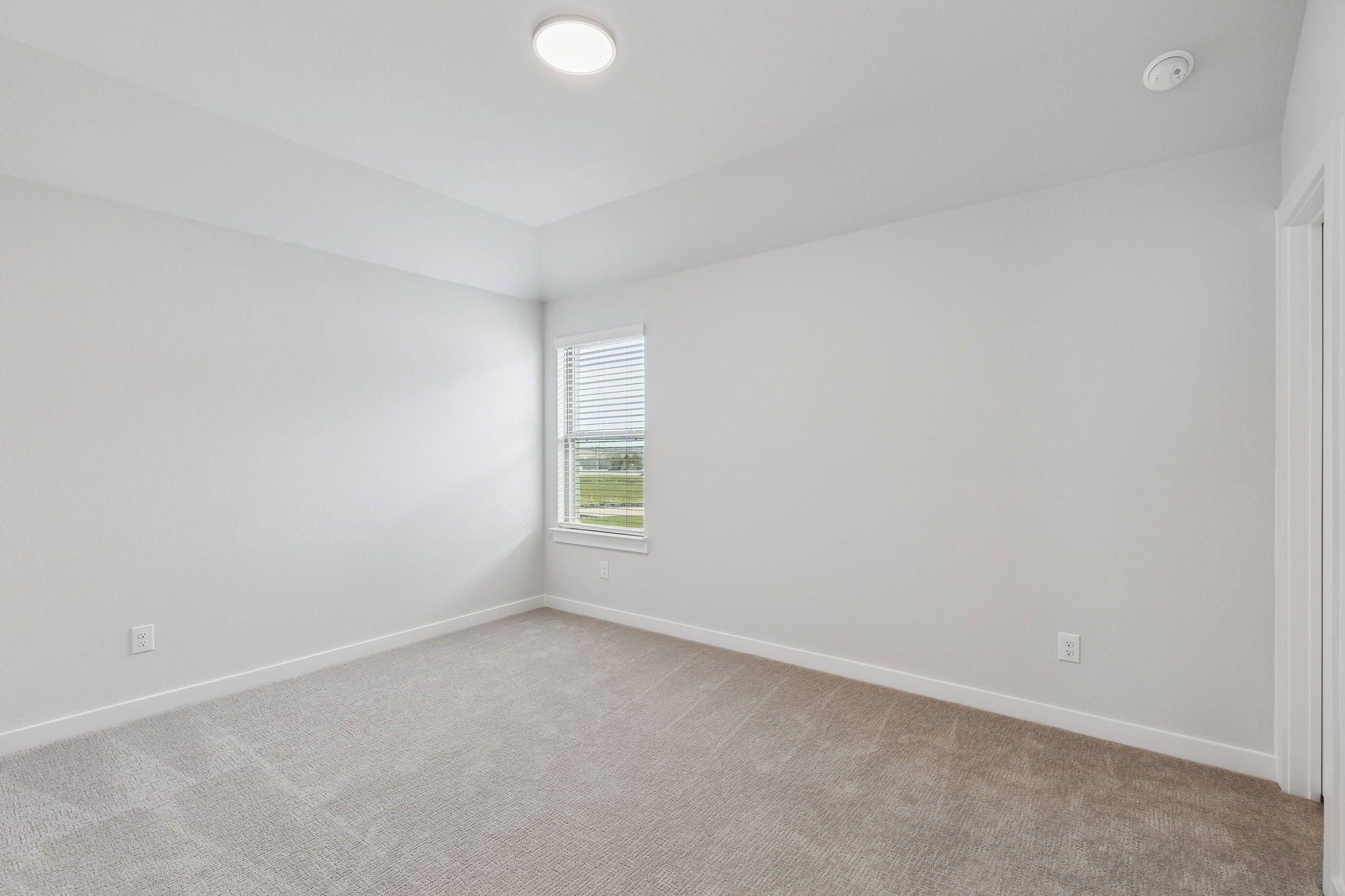 Bedroom in the Stanley II home plan by Trophy Signature Homes – REPRESENTATIVE PHOTO