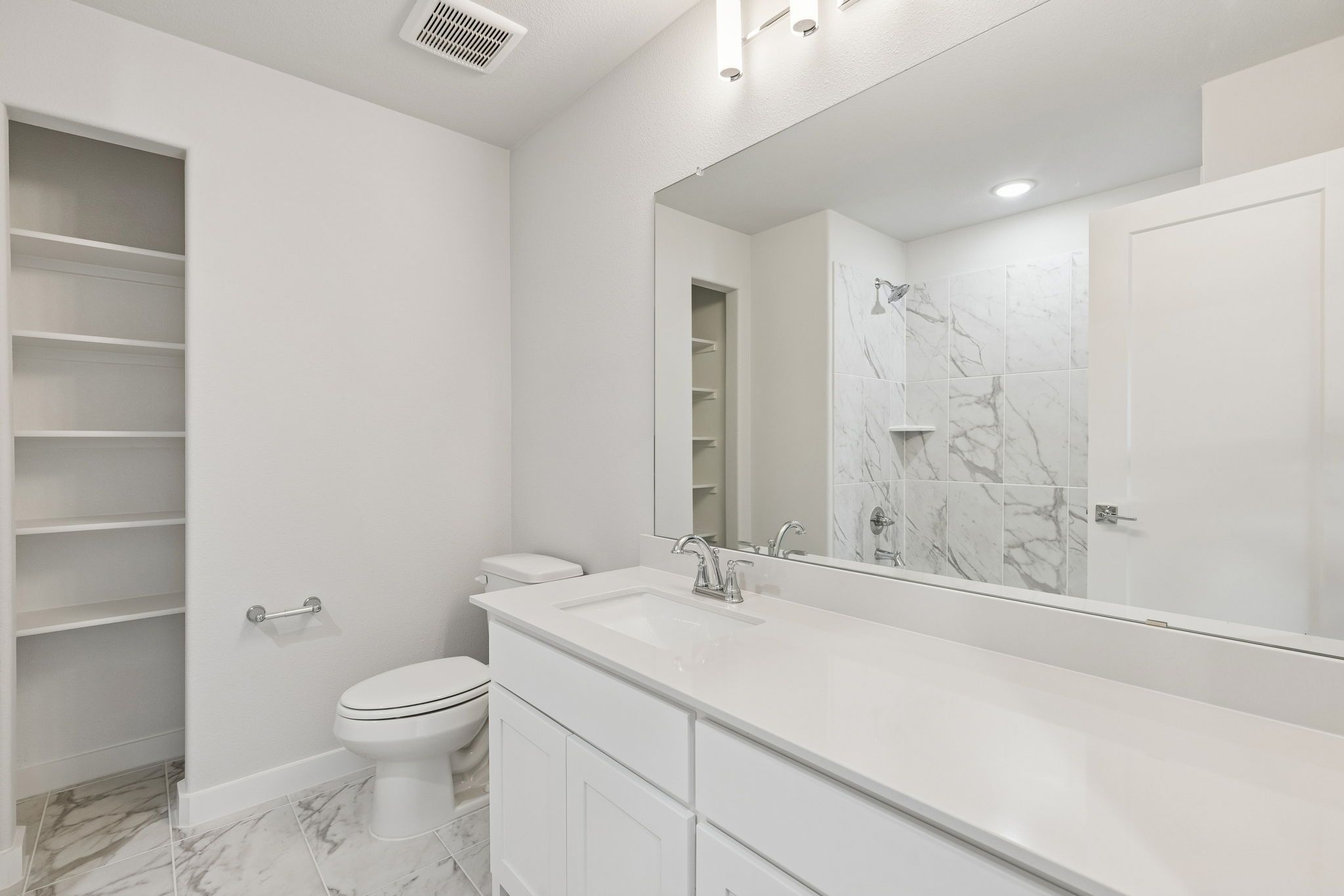 Bathroom in the Stanley II home plan by Trophy Signature Homes – REPRESENTATIVE PHOTO