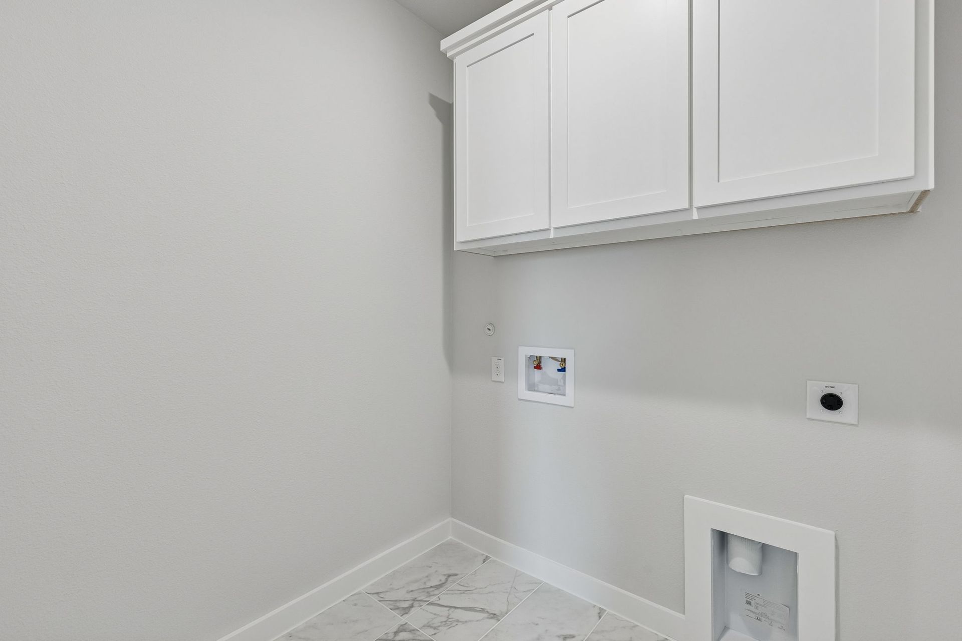 Utility Room in the Stanley II home plan by Trophy Signature Homes – REPRESENTATIVE PHOTO