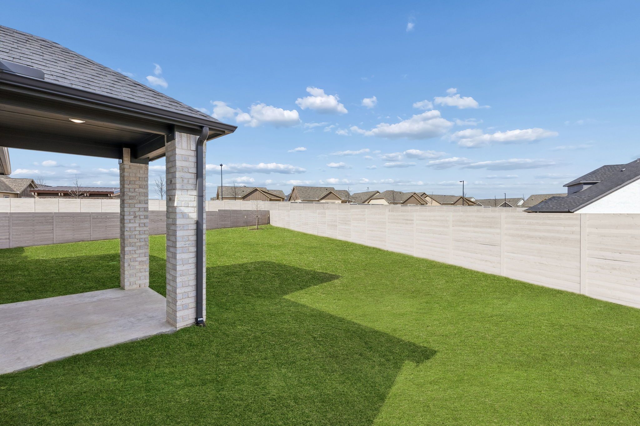 Covered Patio in the Stanley II home plan by Trophy Signature Homes – REPRESENTATIVE PHOTO