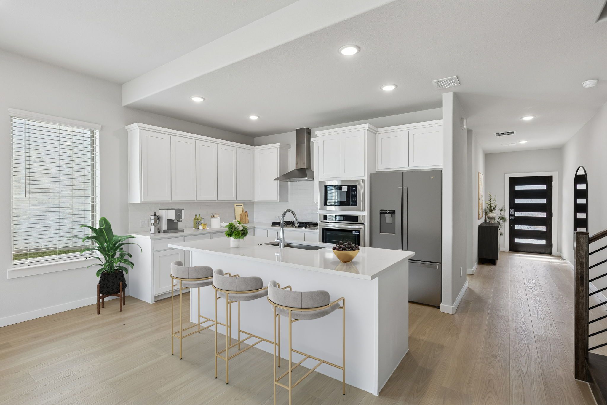 Kitchen in the Stanley II home plan by Trophy Signature Homes – REPRESENTATIVE PHOTO