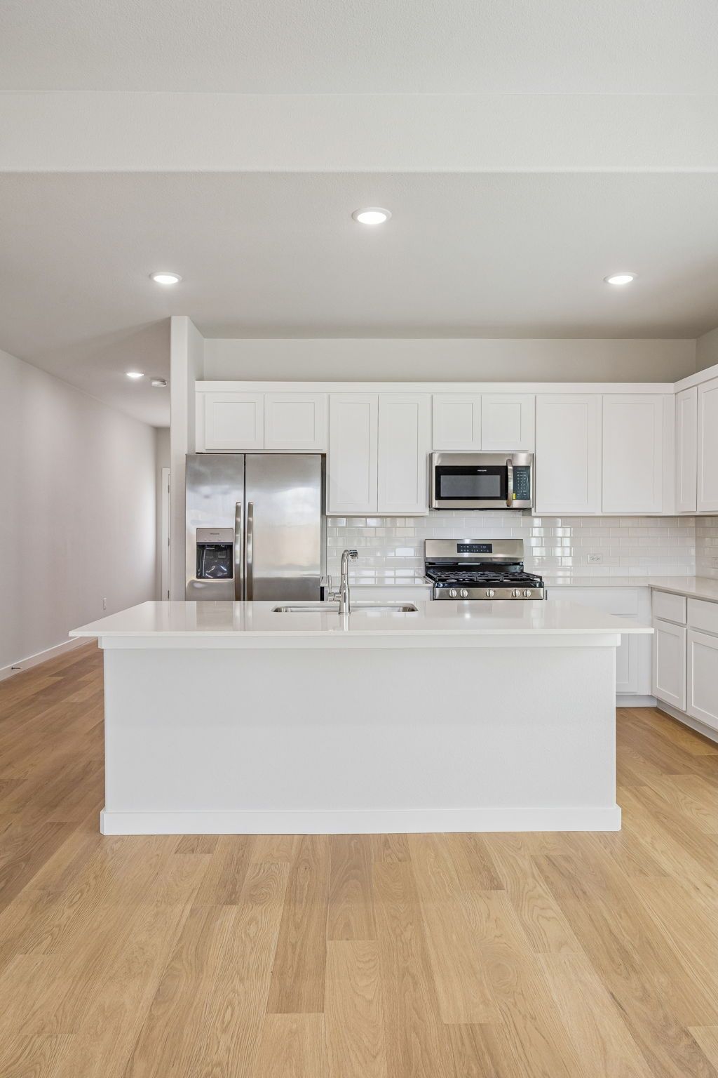 Kitchen in the Stanley II home plan by Trophy Signature Homes – REPRESENTATIVE PHOTO