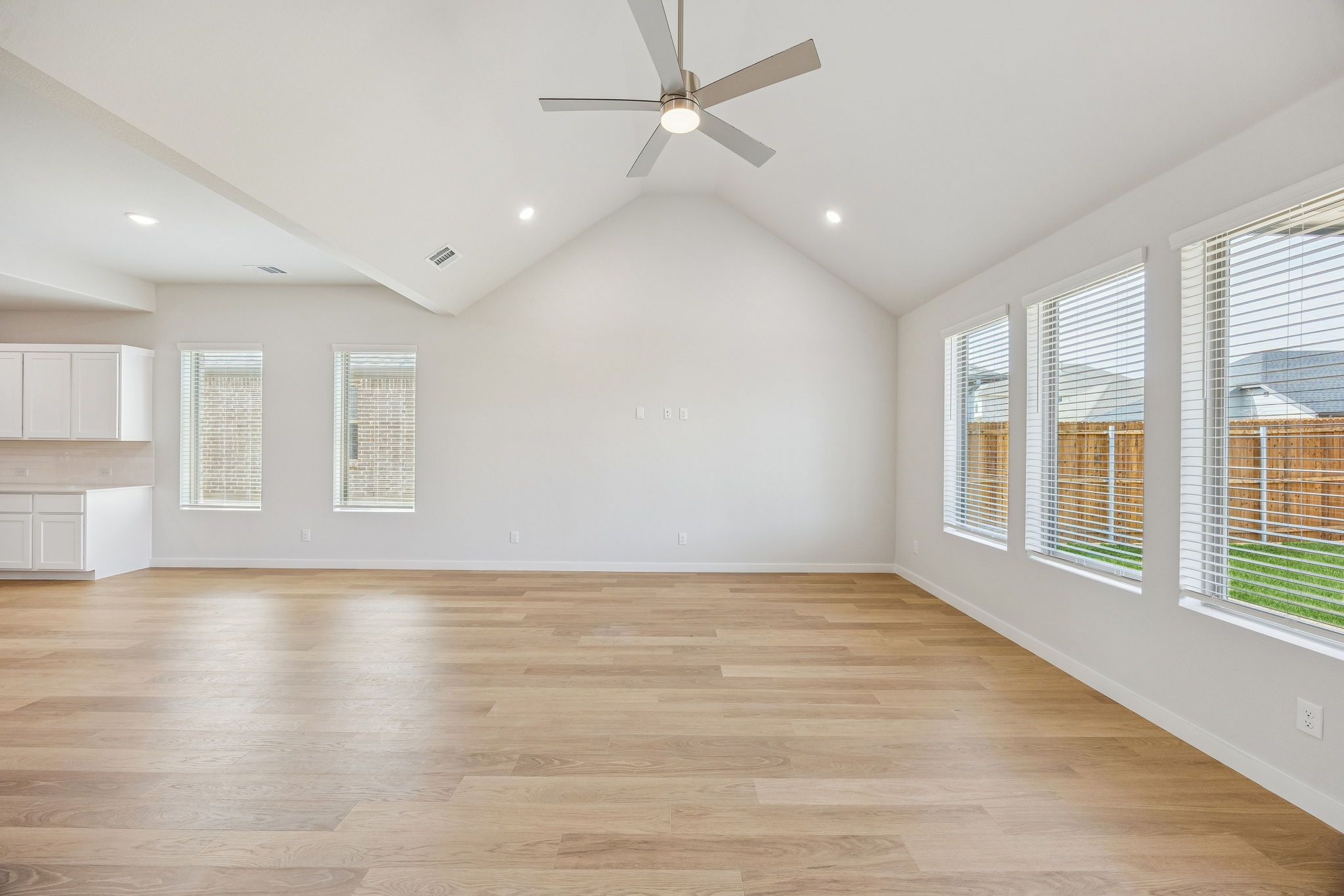 Living and Dining Room in the Stanley II home plan by Trophy Signature Homes – REPRESENTATIVE PHO