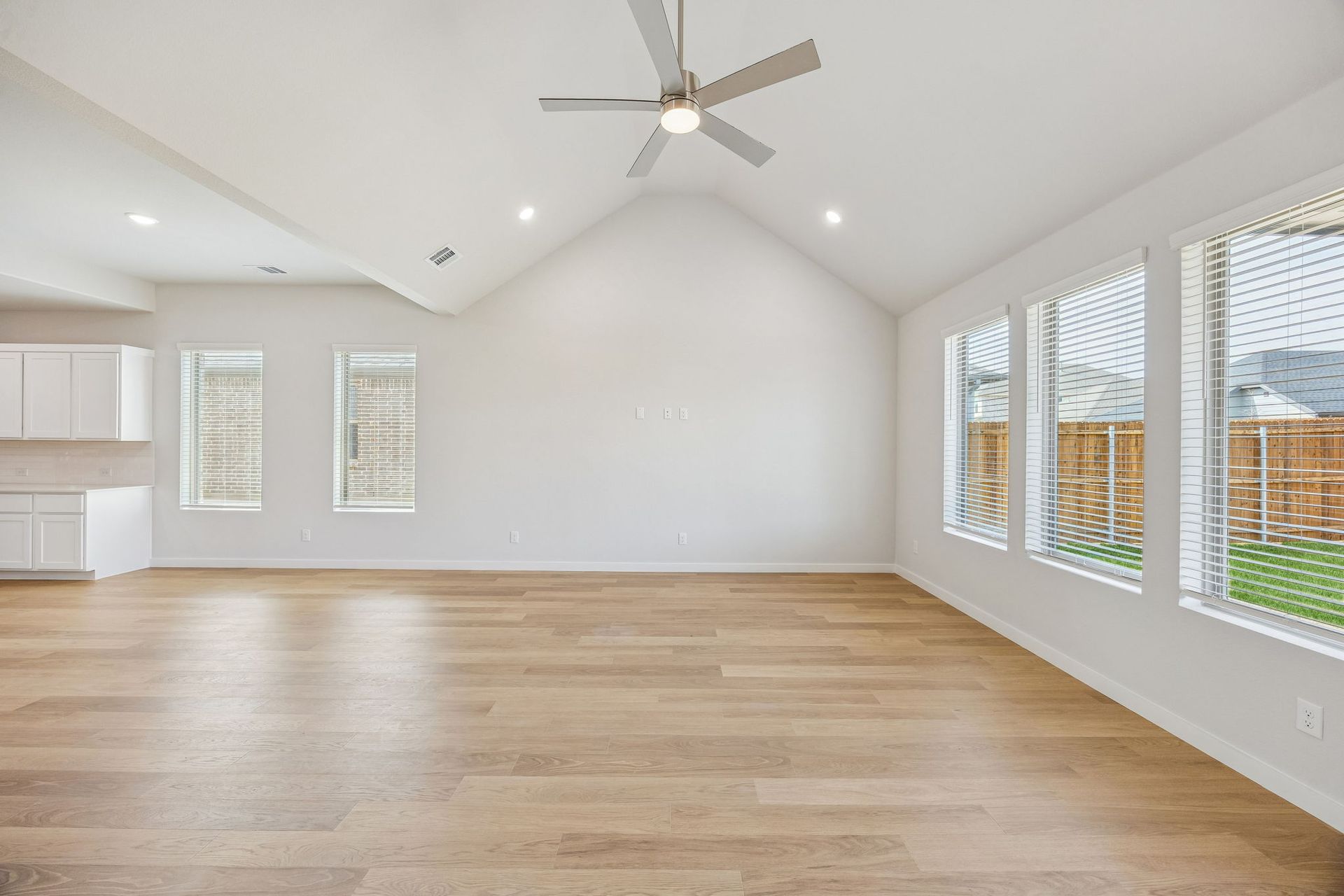 Living and Dining Room in the Stanley II home plan by Trophy Signature Homes – REPRESENTATIVE PHO