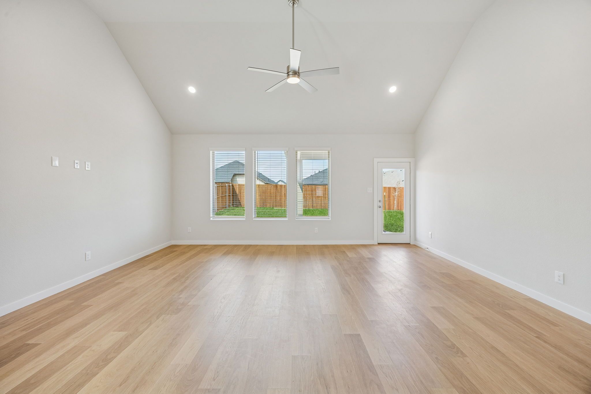 Living and Dining Room in the Stanley II home plan by Trophy Signature Homes – REPRESENTATIVE PHO