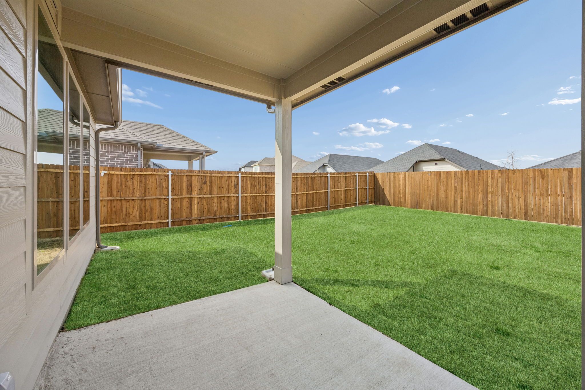 Covered Patio in the Stanley II home plan by Trophy Signature Homes – REPRESENTATIVE PHOTO