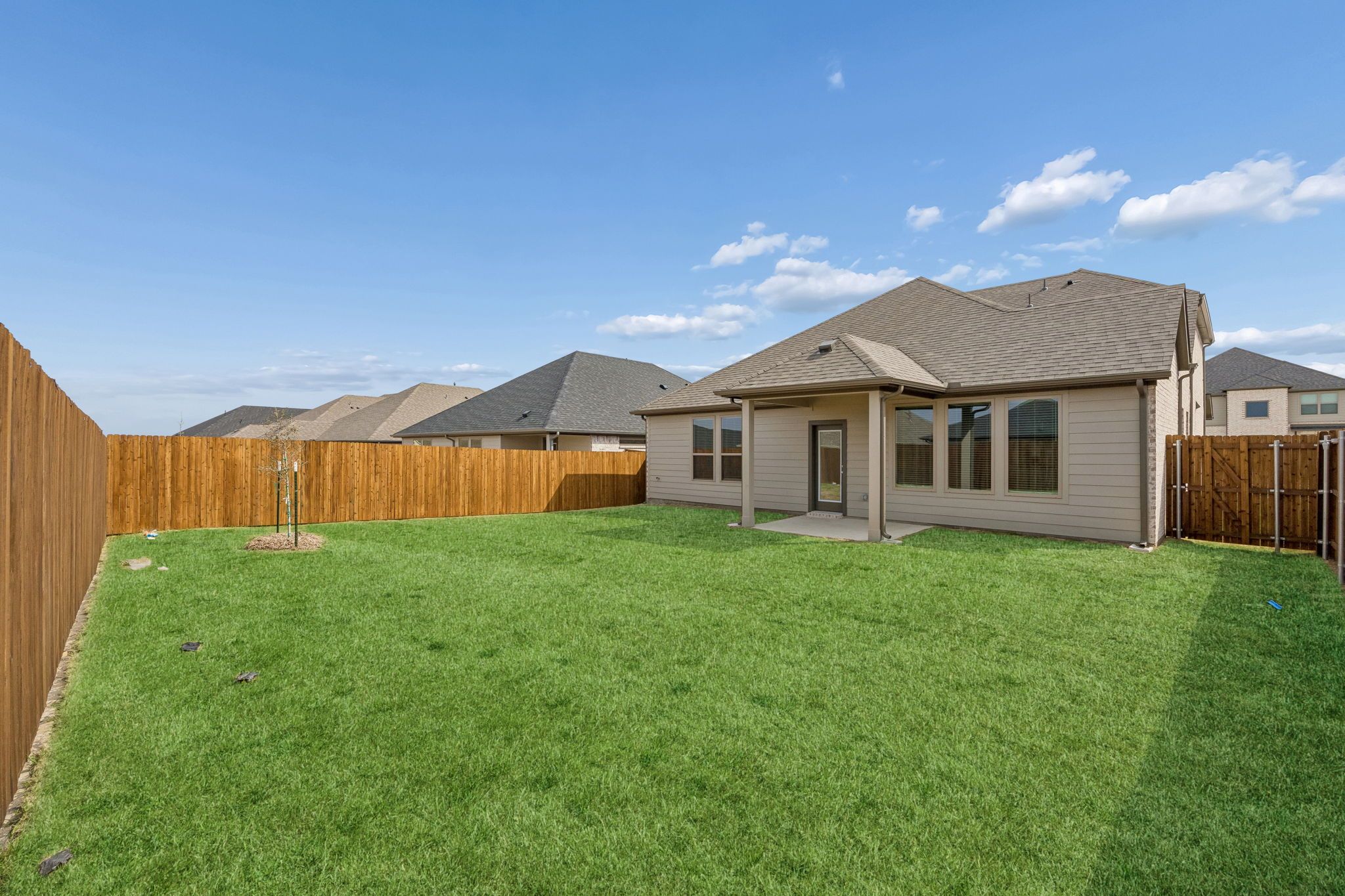 Covered Patio in the Stanley II home plan by Trophy Signature Homes – REPRESENTATIVE PHOTO
