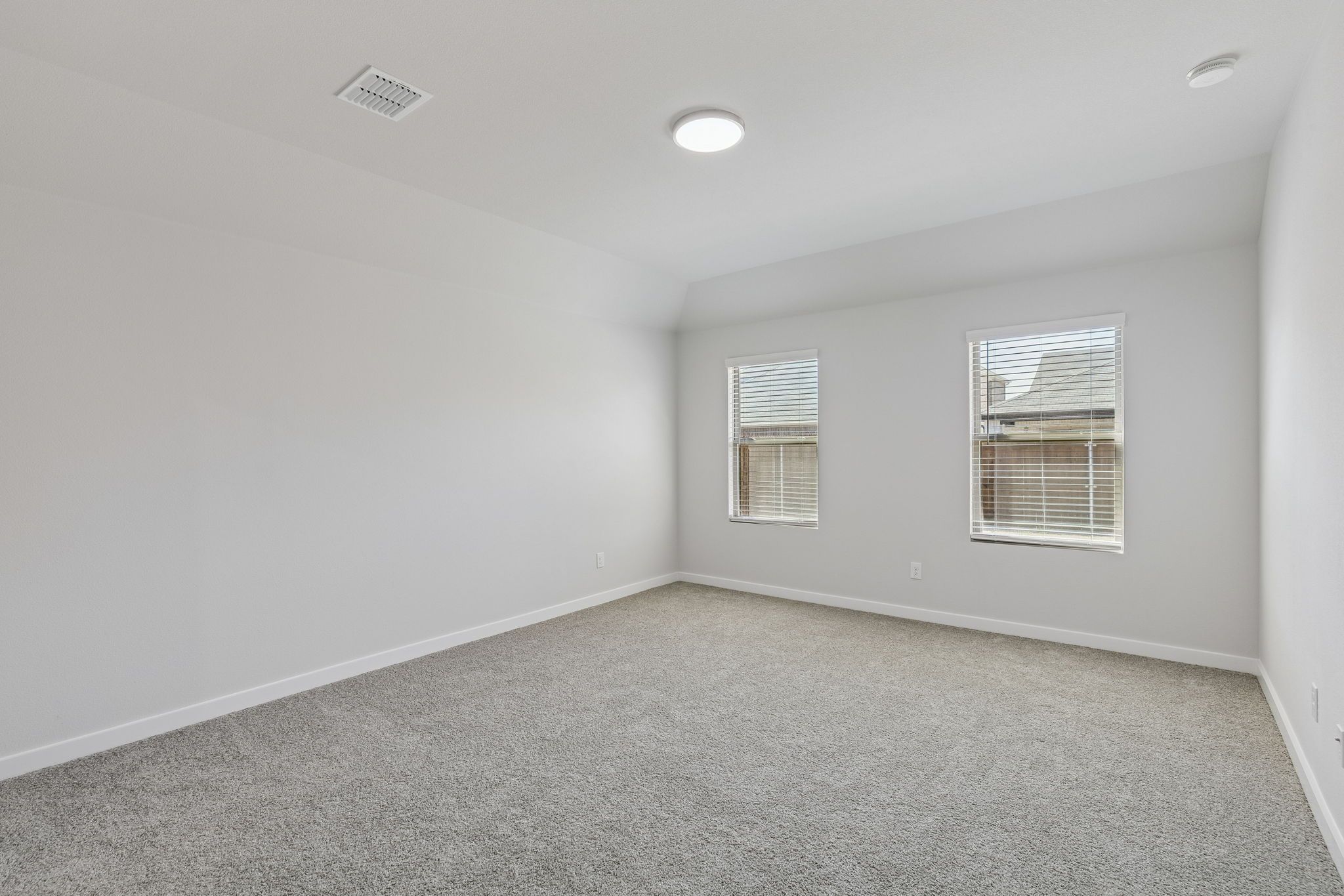 Primary Suite in the Harrison home plan by Trophy Signature Homes – REPRESENTATIVE PHOTO
