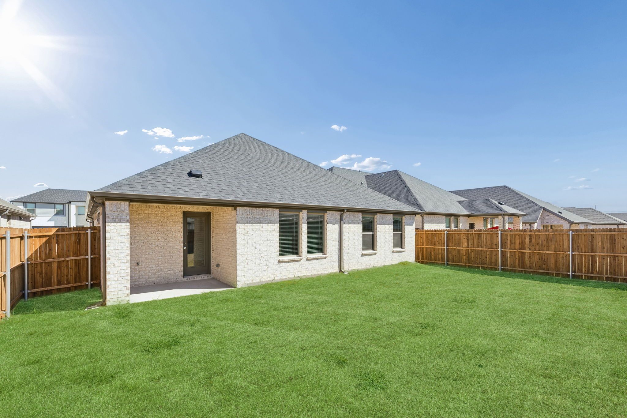 Covered Patio in the Harrison home plan by Trophy Signature Homes – REPRESENTATIVE PHOTO