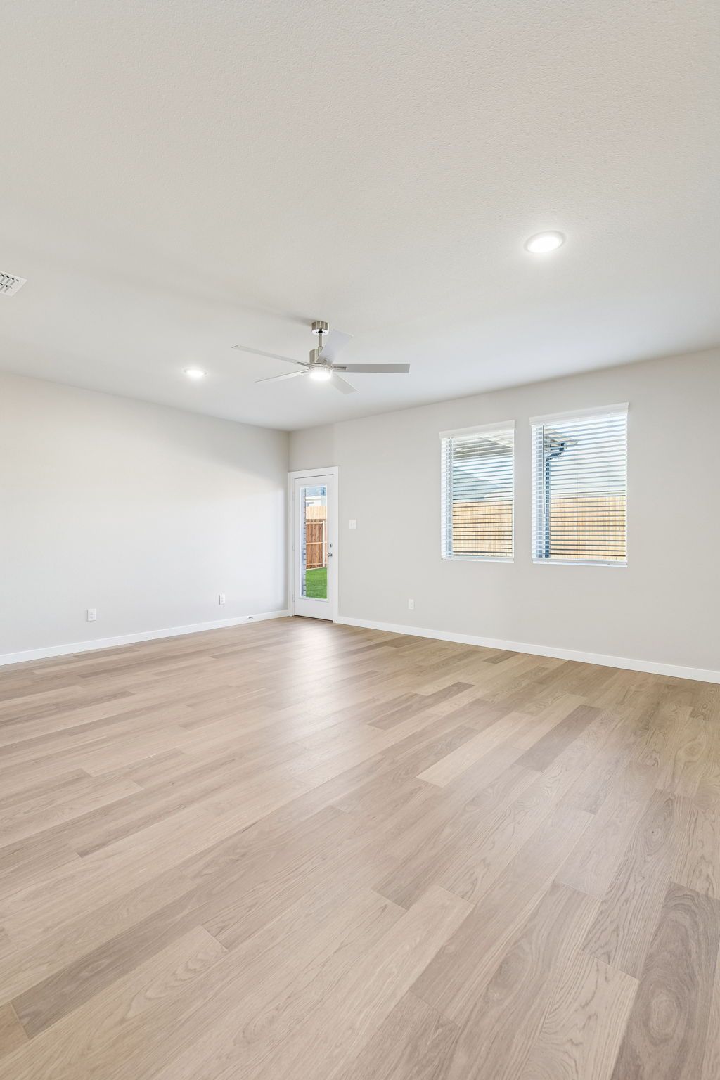 Living Room in the Haylee home plan by Trophy Signature Homes - REPRESENTATIVE PHOTO