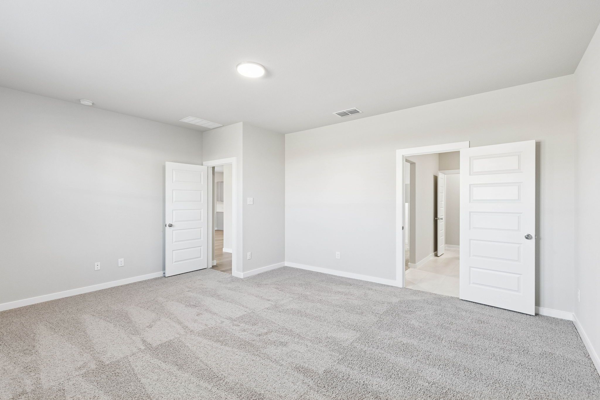 Primary Suite in the Haylee home plan by Trophy Signature Homes - REPRESENTATIVE PHOTO