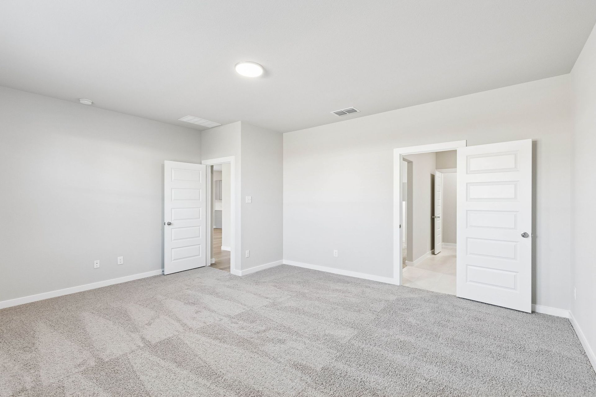 Primary Suite in the Haylee home plan by Trophy Signature Homes - REPRESENTATIVE PHOTO