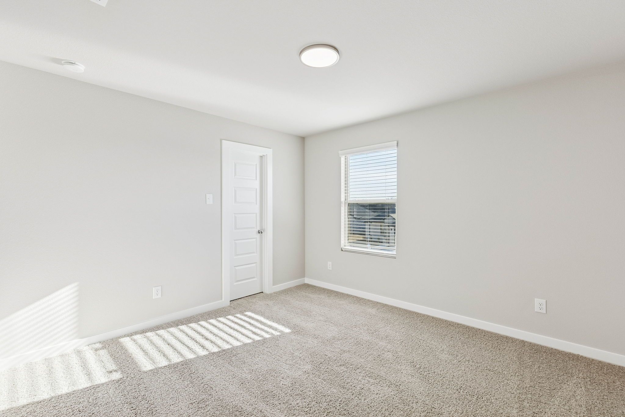 Bedroom in the Haylee home plan by Trophy Signature Homes - REPRESENTATIVE PHOTO