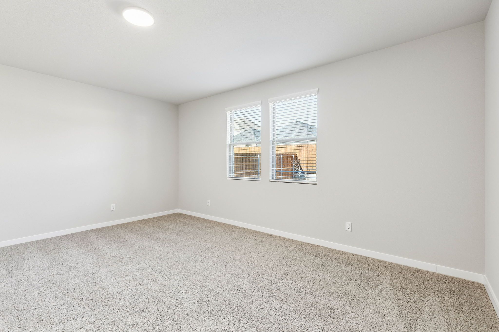 Bedroom in the Haylee home plan by Trophy Signature Homes - REPRESENTATIVE PHOTO