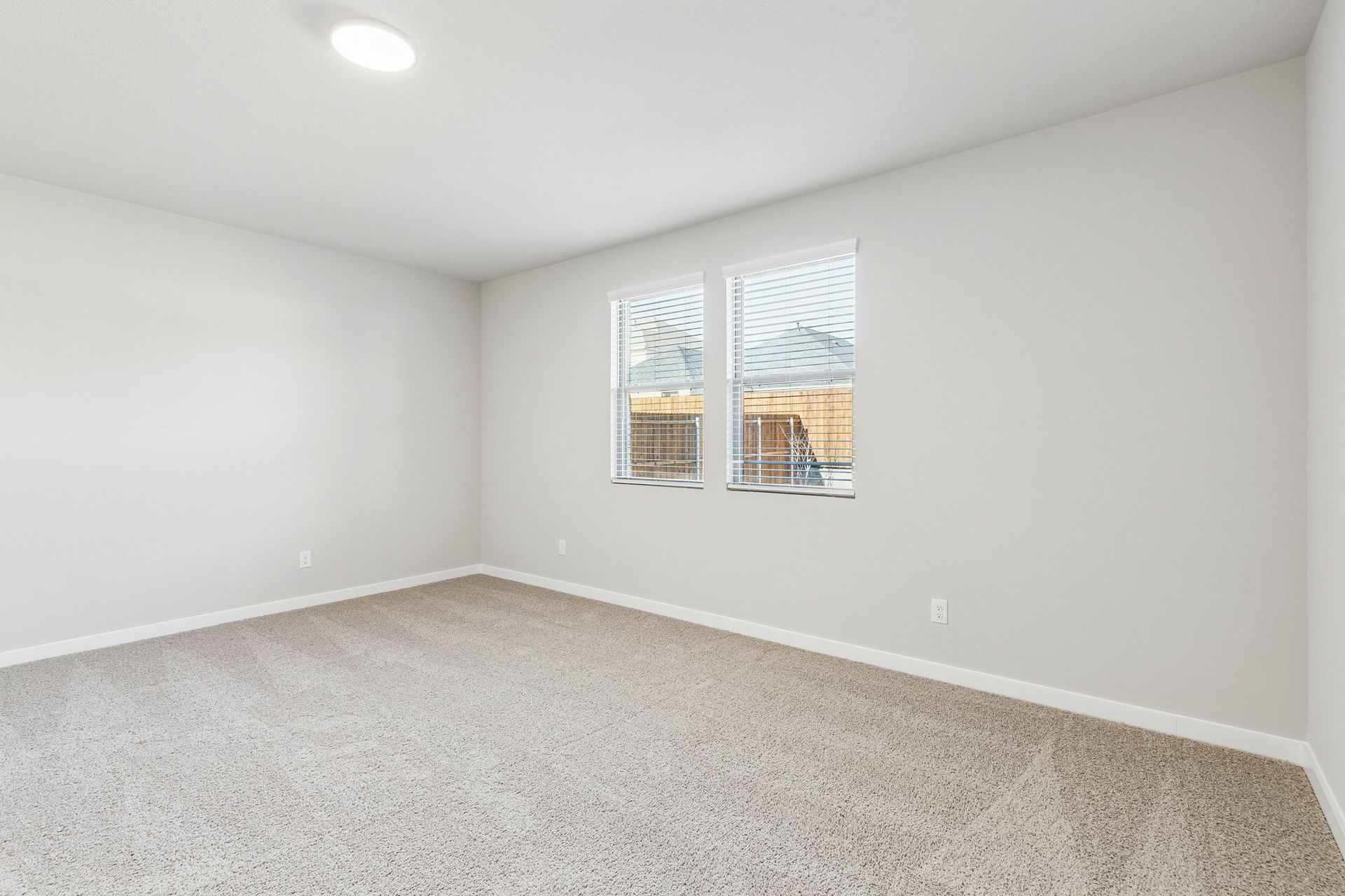 Bedroom in the Haylee home plan by Trophy Signature Homes - REPRESENTATIVE PHOTO